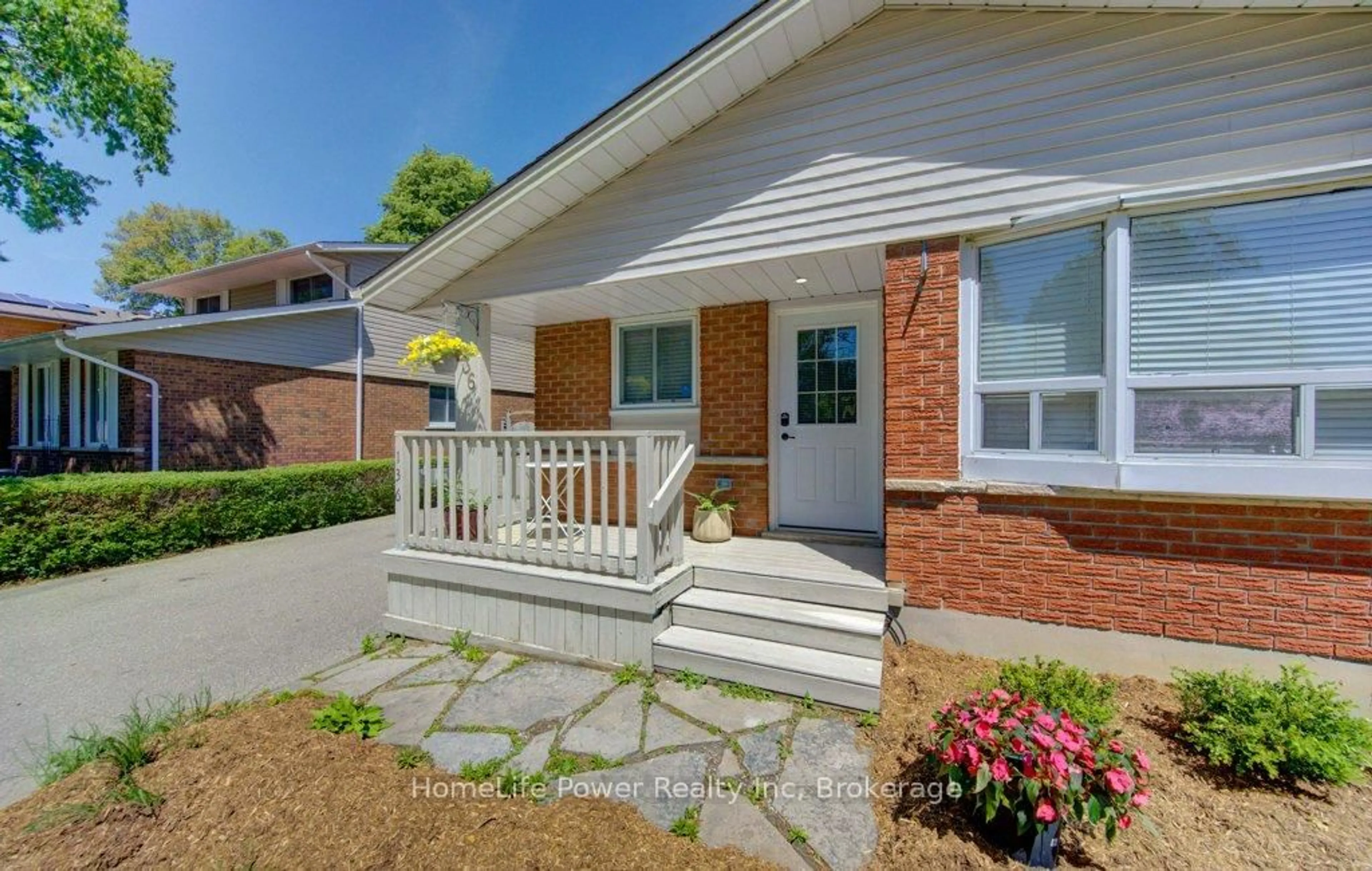 Home with brick exterior material, street for 136 Dunsmere Dr, Kitchener Ontario N2E 1V7
