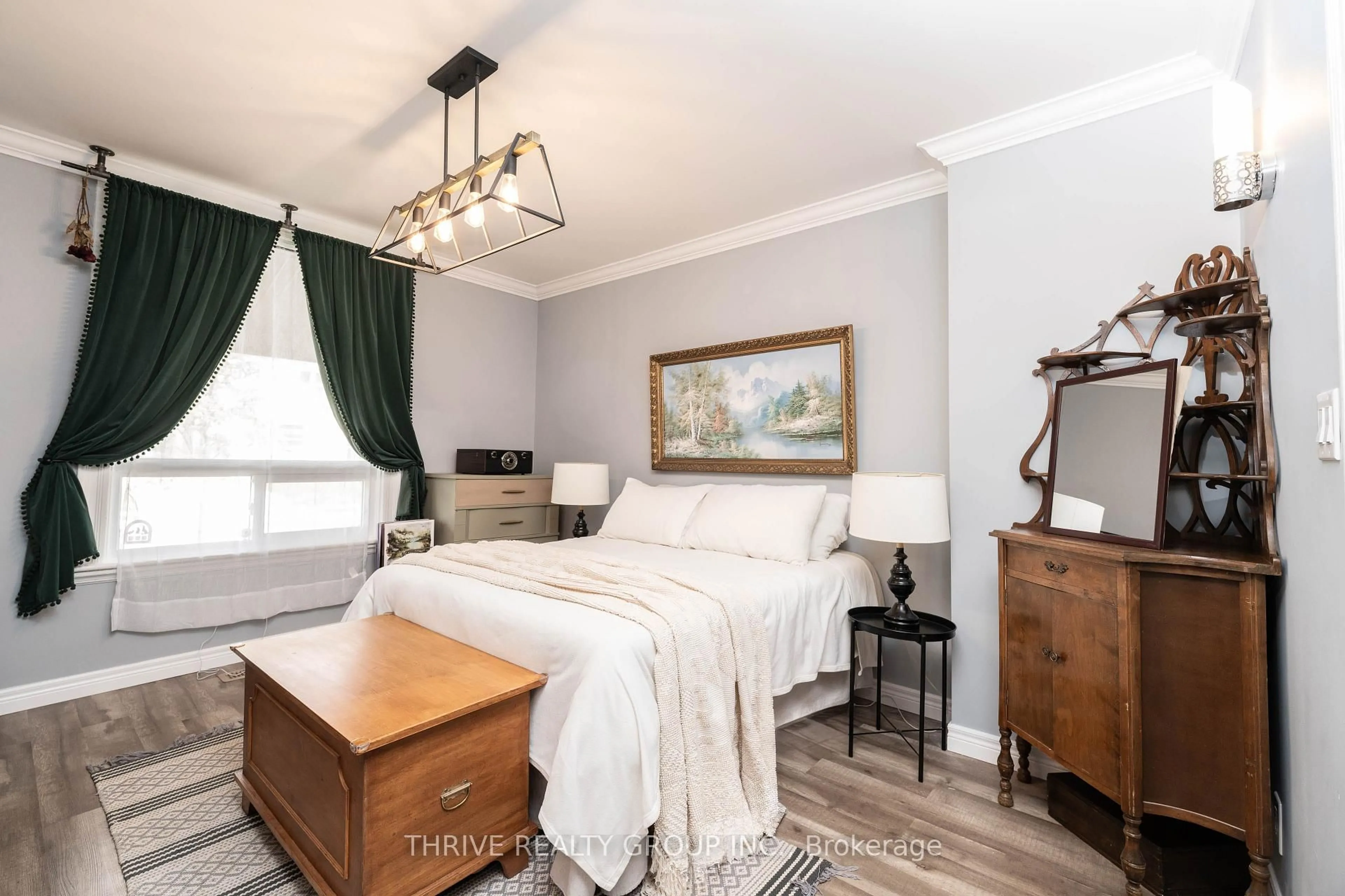 Bedroom with bed, wood/laminate floor for 247 Egerton St, London East Ontario N5Z 2G9