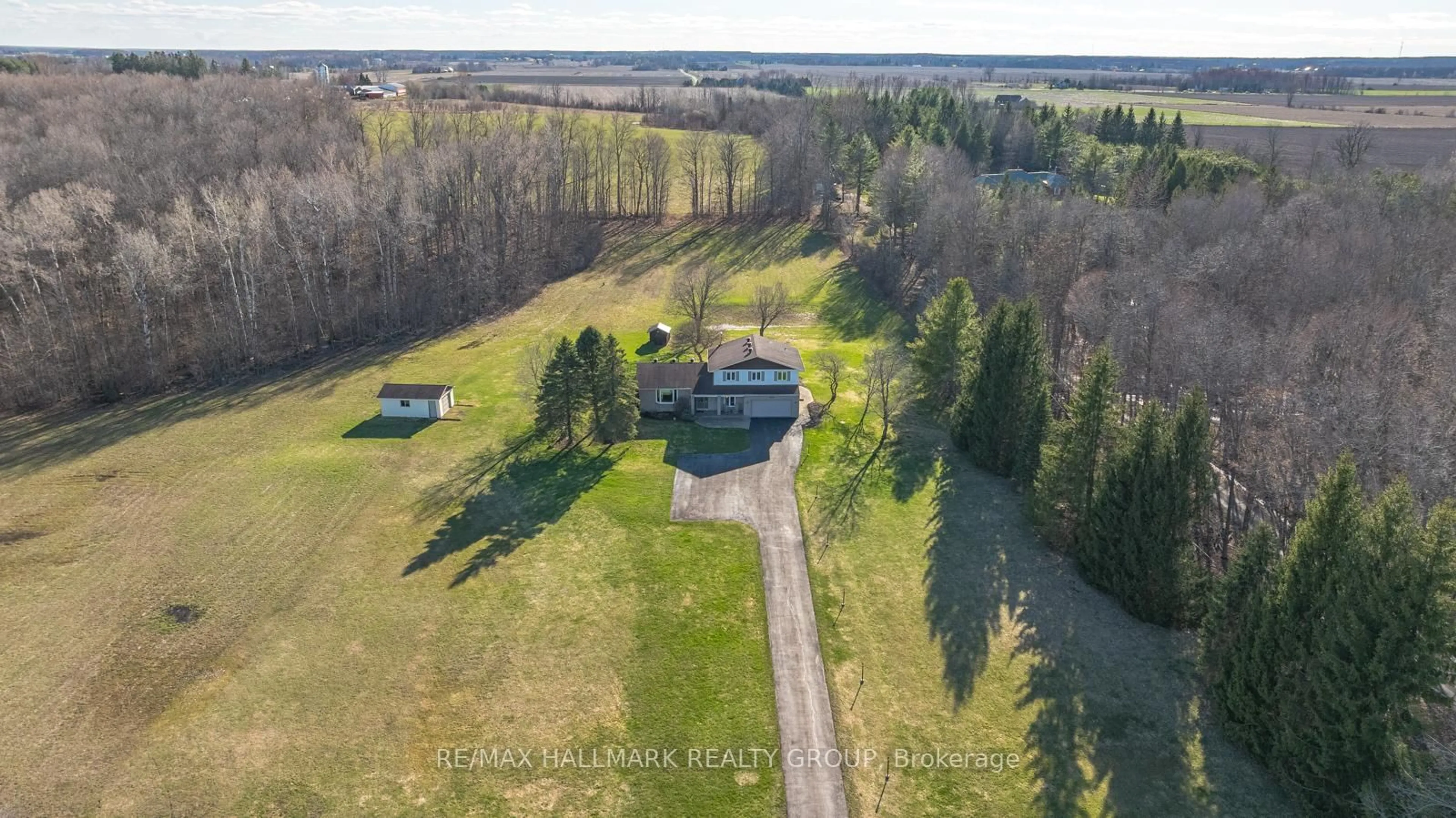 A pic from outside/outdoor area/front of a property/back of a property/a pic from drone, water/lake/river/ocean view for 1376 MacDonald Rd, Russell Ontario K4R 0K1