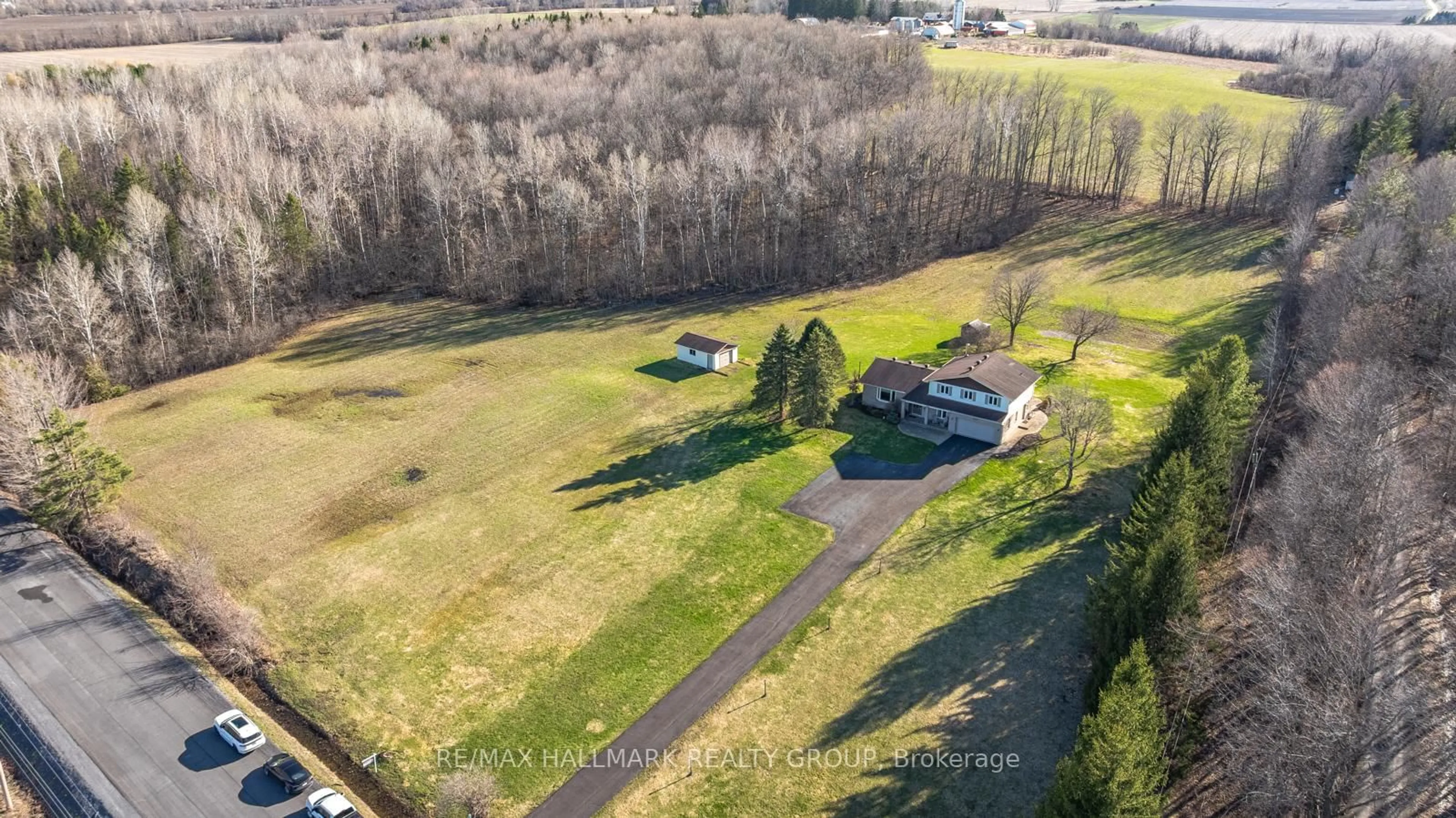 A pic from outside/outdoor area/front of a property/back of a property/a pic from drone, unknown for 1376 MacDonald Rd, Russell Ontario K4R 0K1