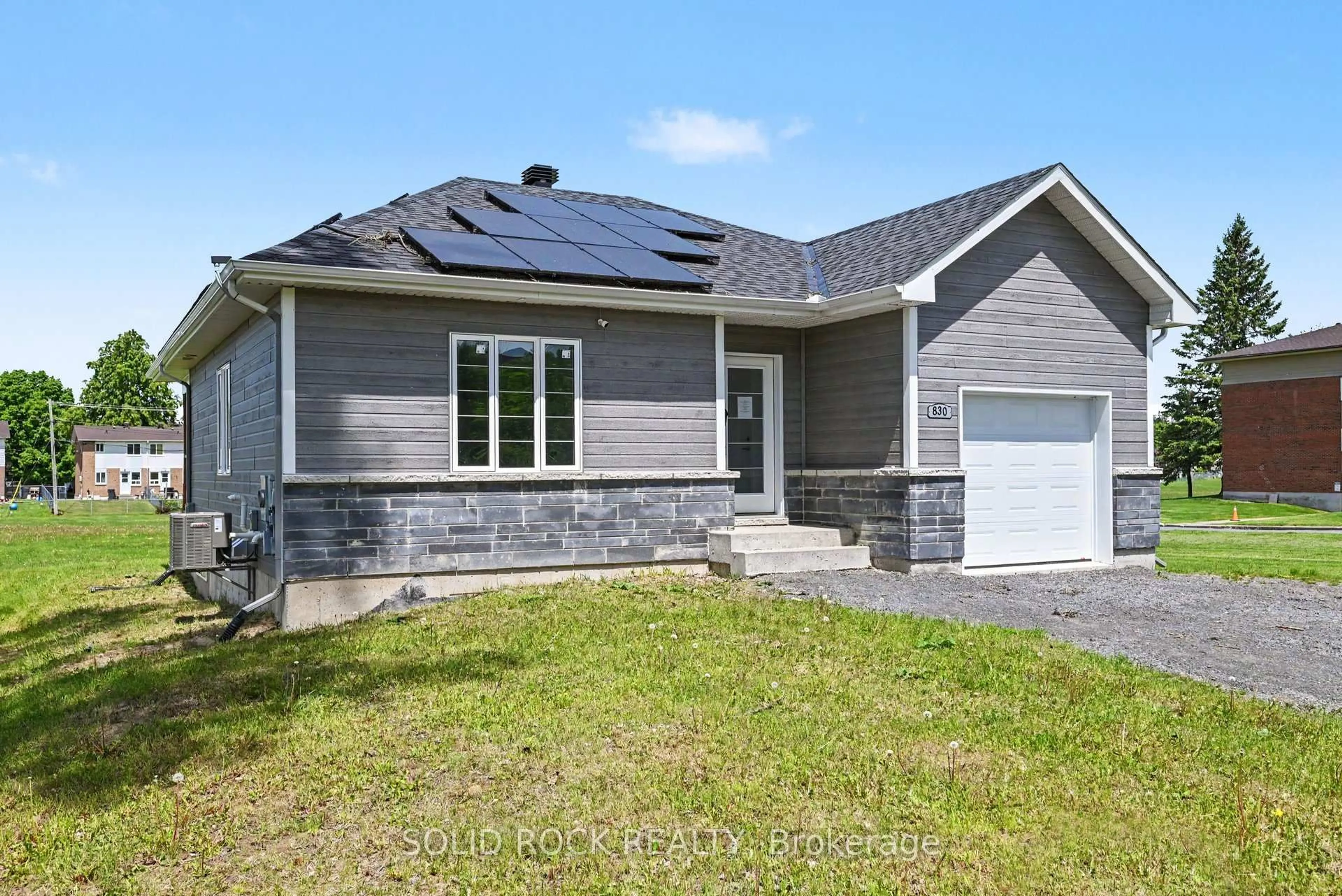 Home with brick exterior material, street for 830 Portelance Ave, Hawkesbury Ontario K6A 2Z4
