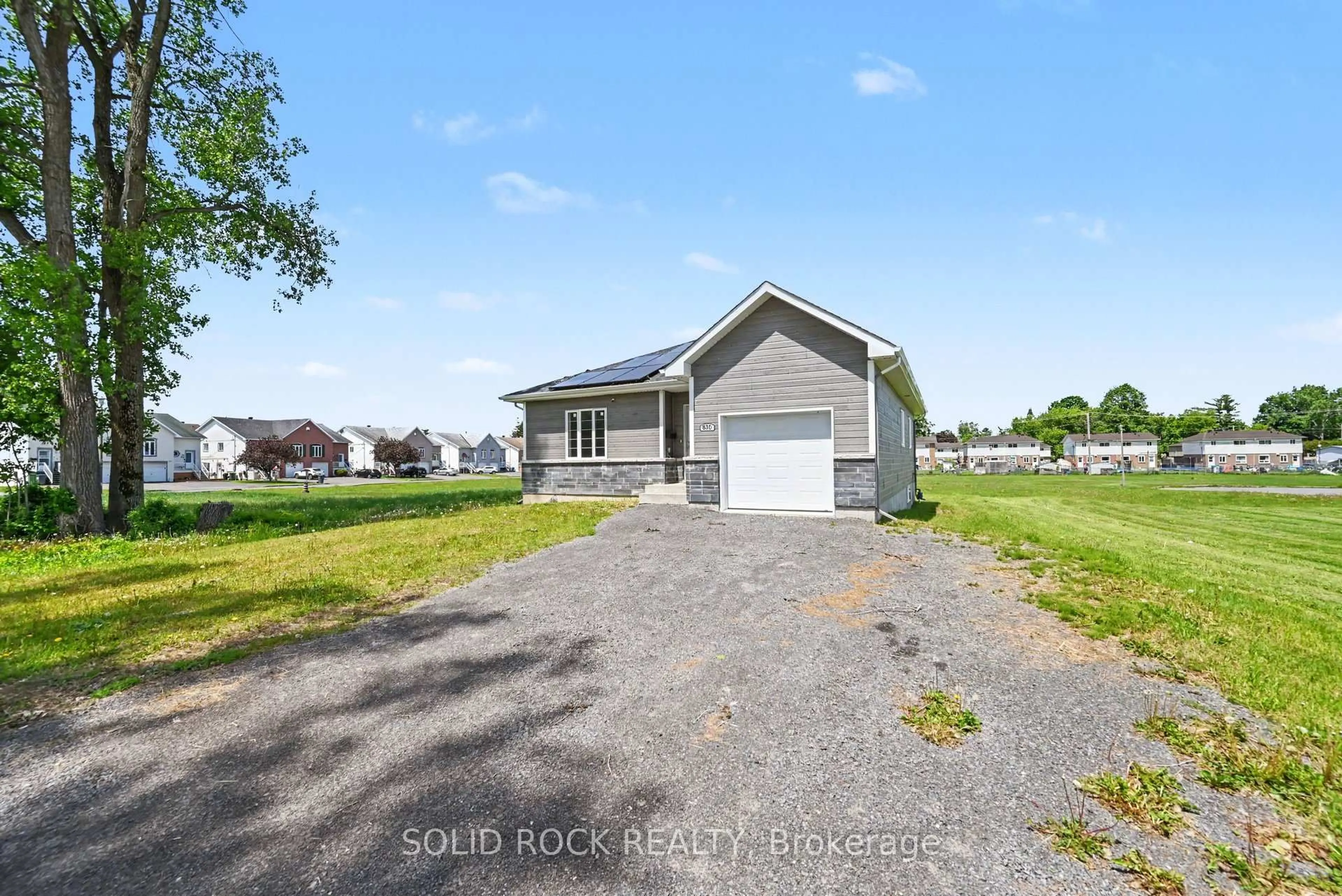 A pic from outside/outdoor area/front of a property/back of a property/a pic from drone, street for 830 Portelance Ave, Hawkesbury Ontario K6A 2Z4