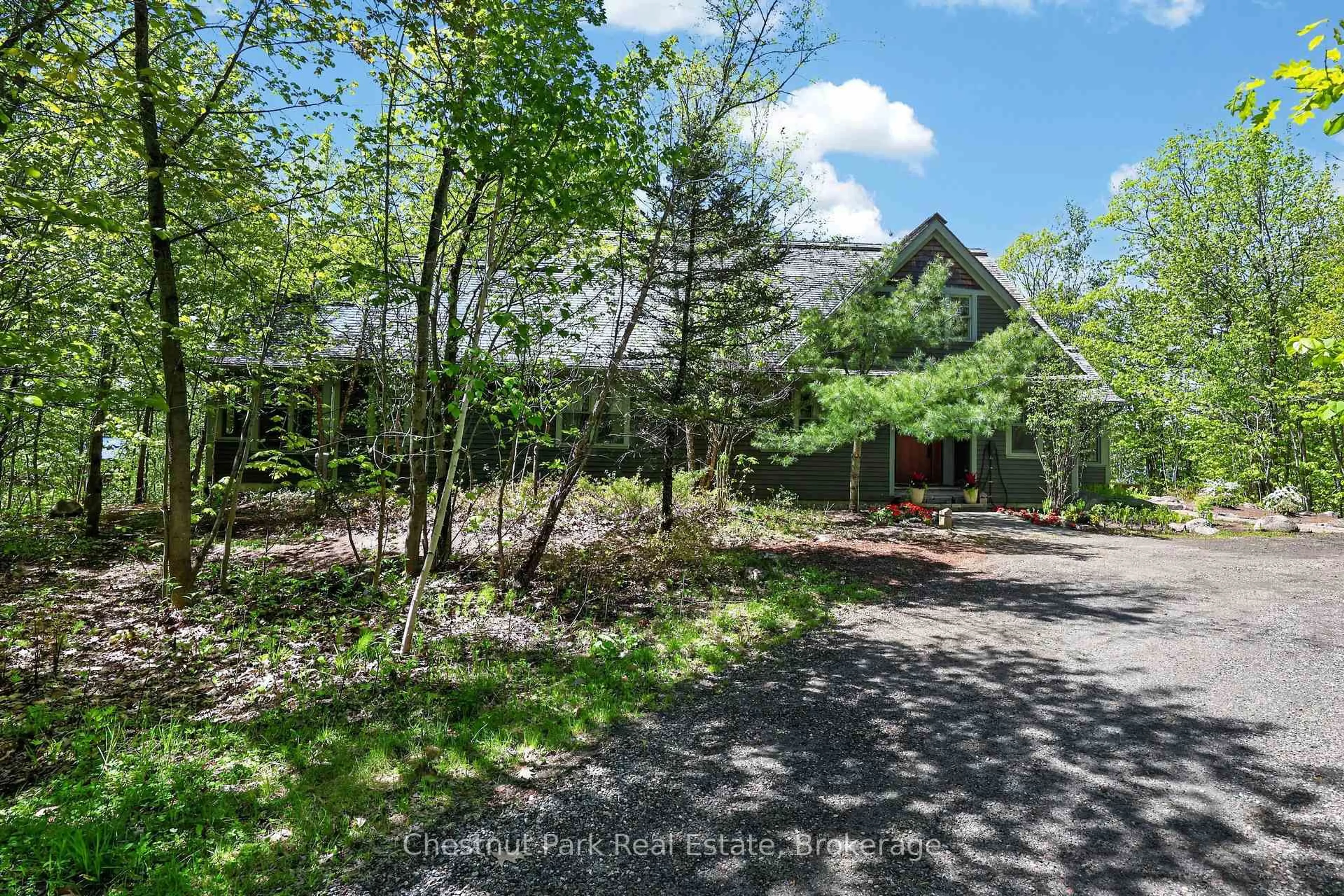 A pic from outside/outdoor area/front of a property/back of a property/a pic from drone, forest/trees view for 4805 Muskoka Road 169 Highway #Unit #9, Muskoka Lakes Ontario P0C 1H0