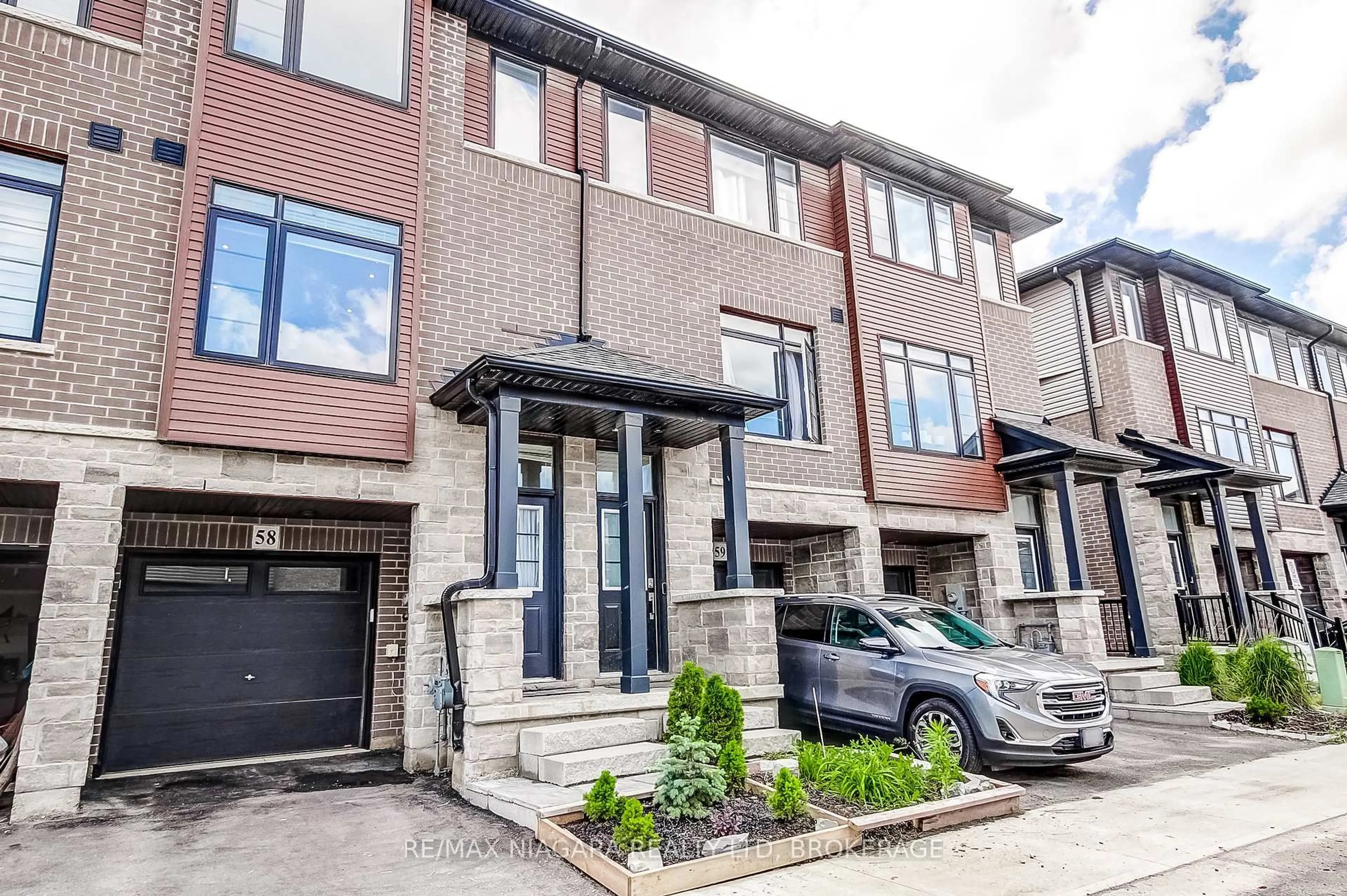 Home with brick exterior material, street for 461 Blackburn Dr #58, Brantford Ontario N3T 6S8