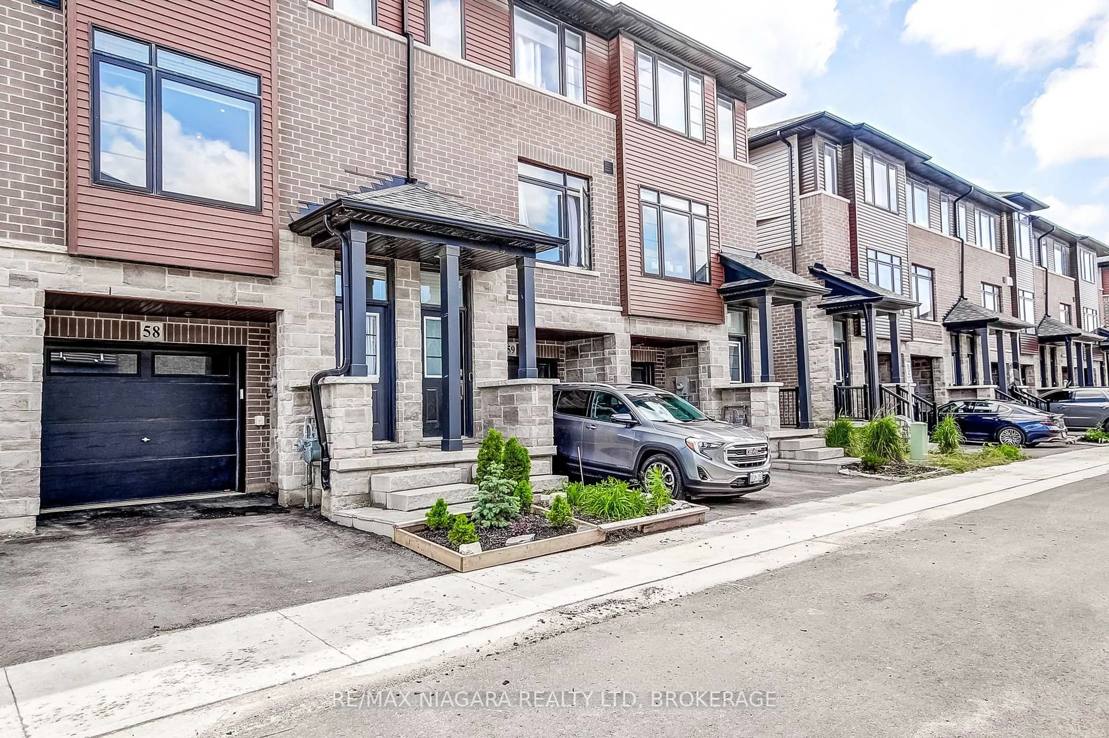 Home with brick exterior material, street for 461 Blackburn Dr #58, Brantford Ontario N3T 6S8