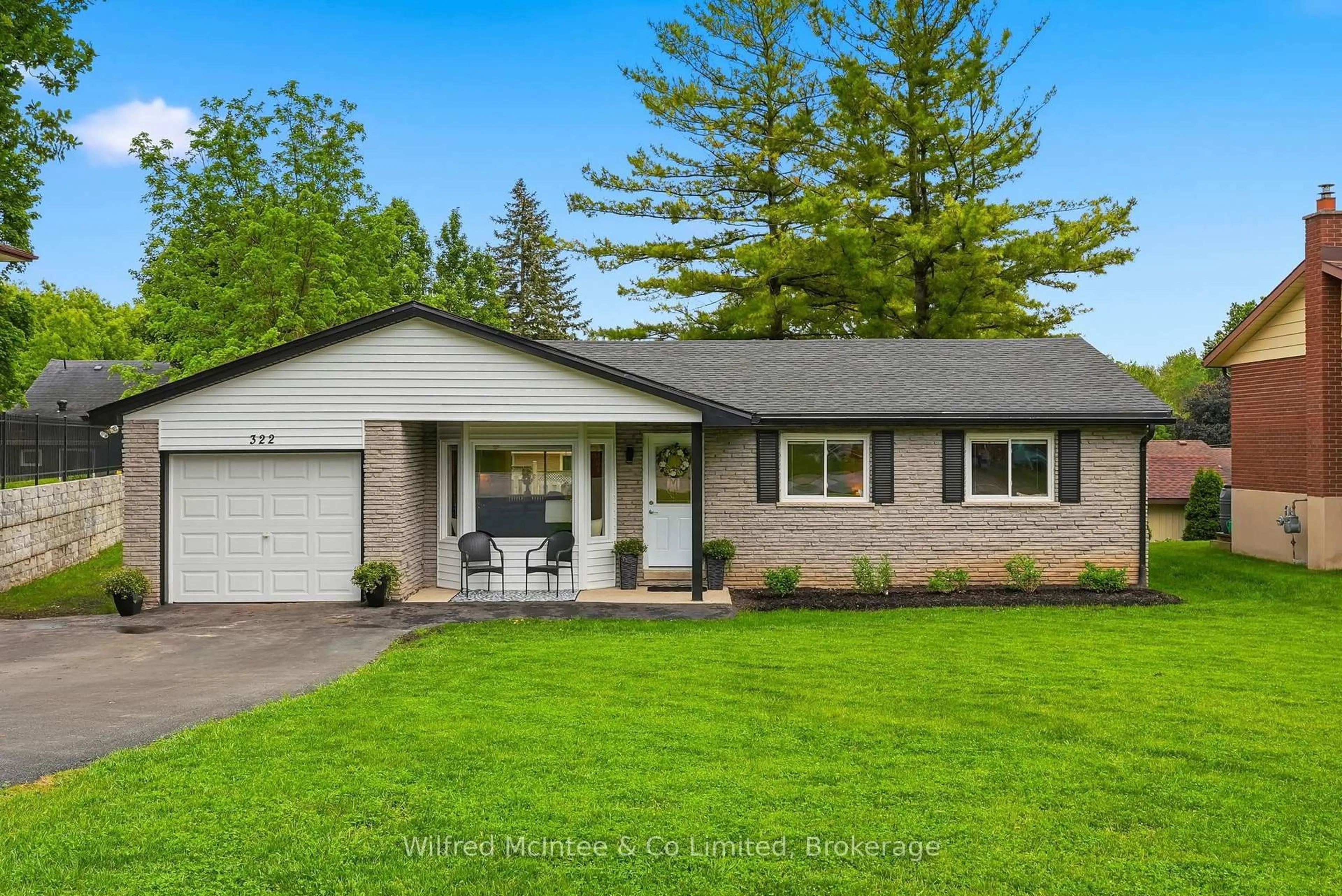 Home with vinyl exterior material, street for 322 Thomas St, Brockton Ontario N0G 2V0