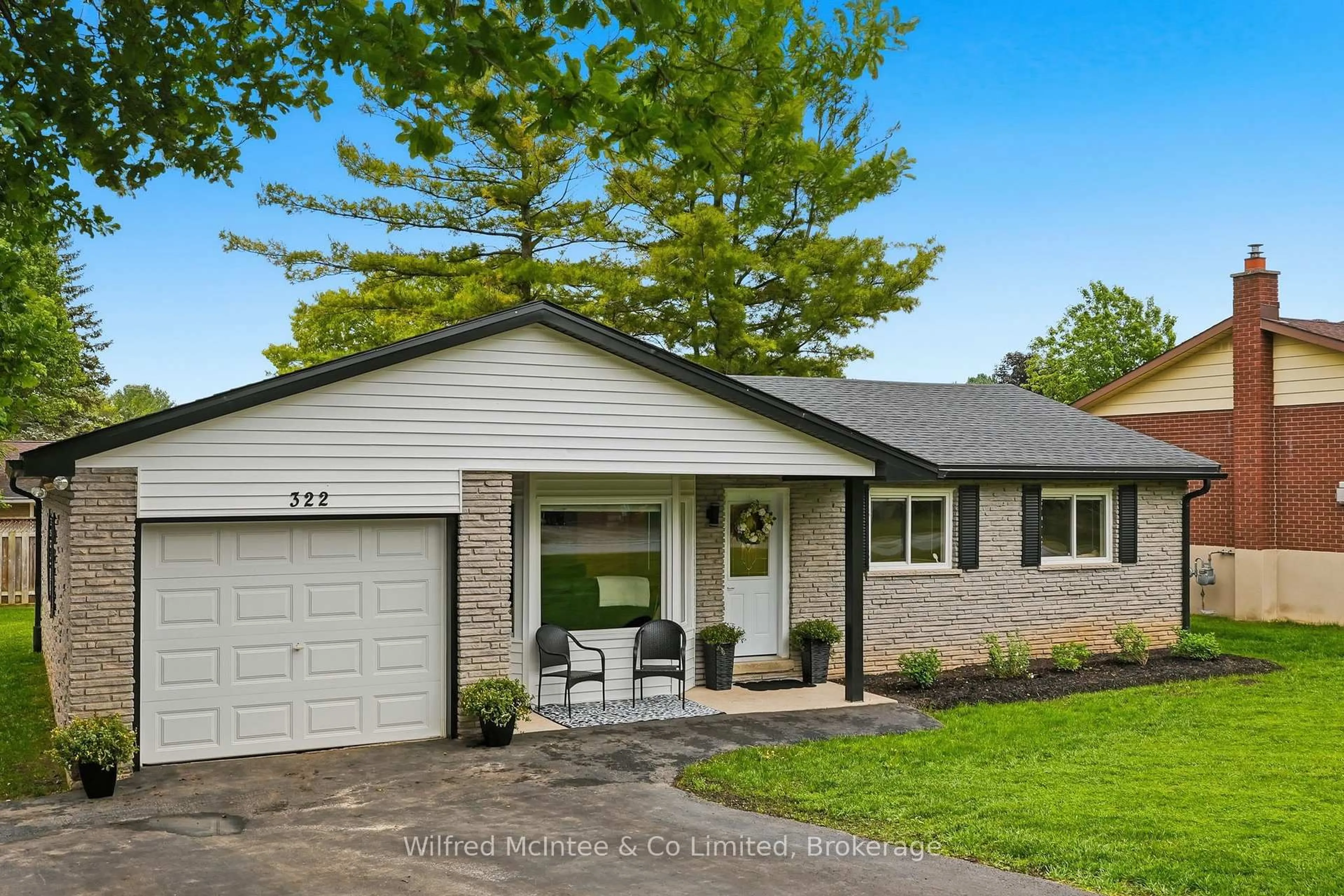 Home with vinyl exterior material, street for 322 Thomas St, Brockton Ontario N0G 2V0