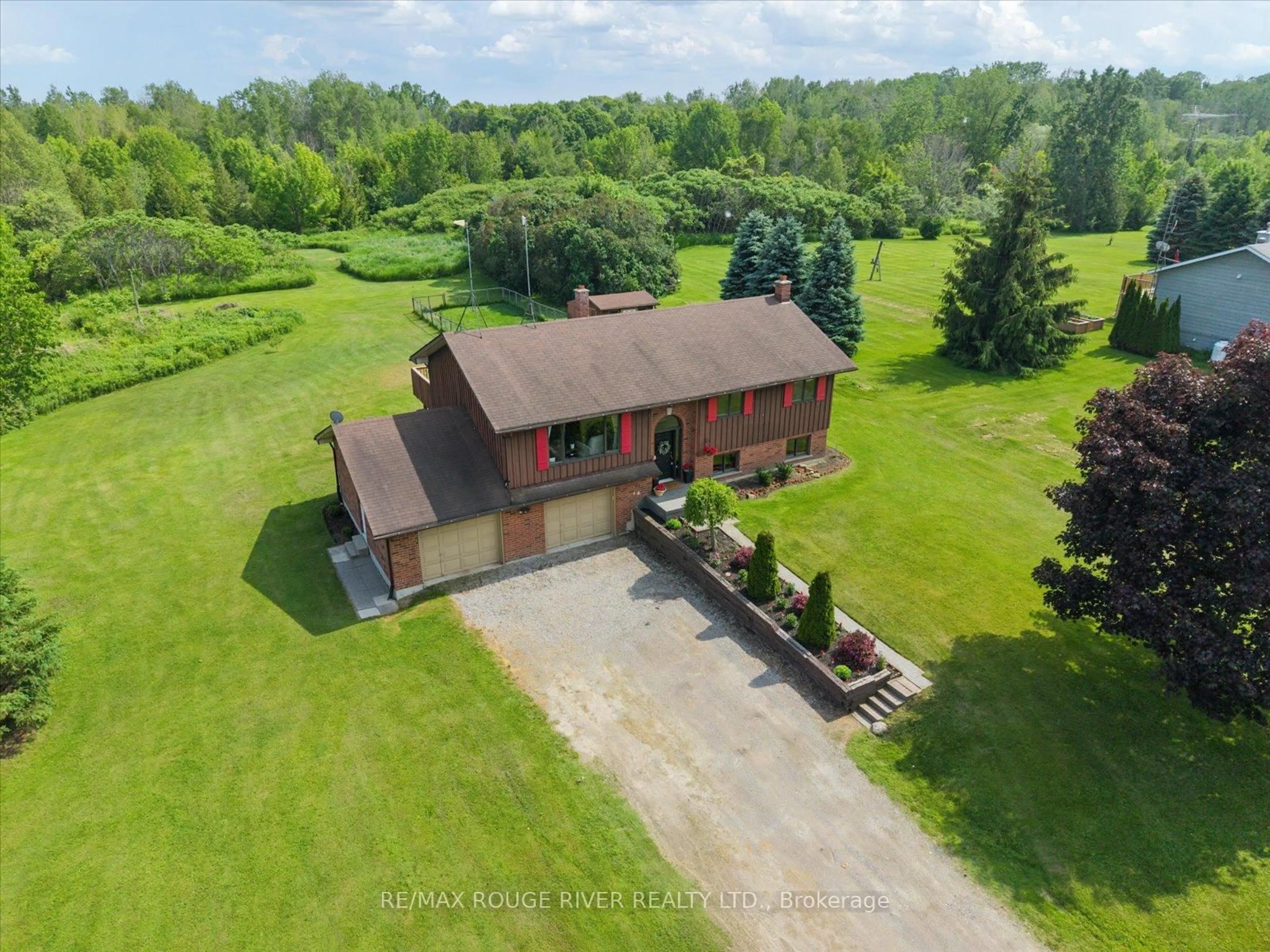 A pic from outside/outdoor area/front of a property/back of a property/a pic from drone, unknown for 1325 Lakeshore Rd, Port Hope Ontario L1A 3V7