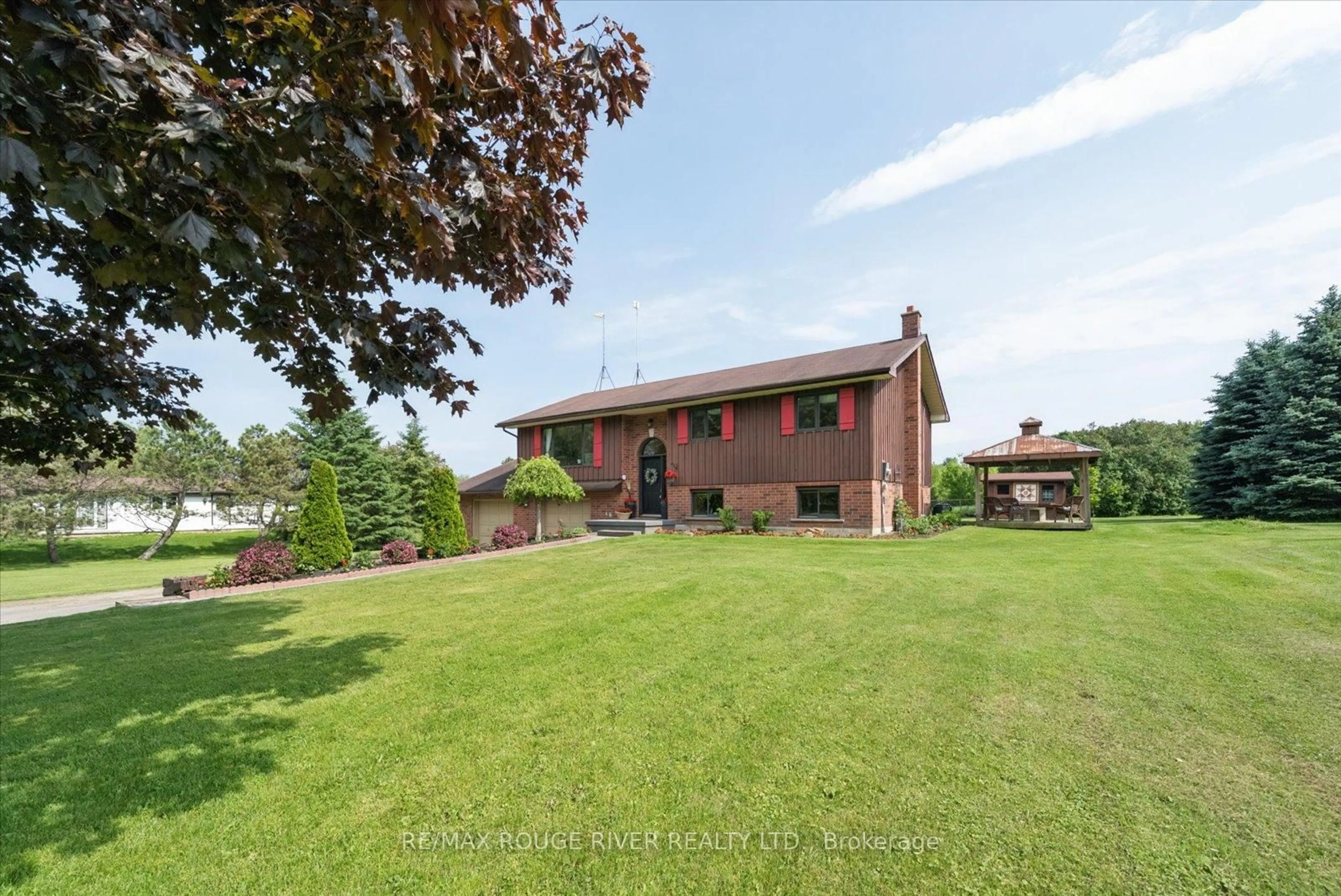 A pic from outside/outdoor area/front of a property/back of a property/a pic from drone, unknown for 1325 Lakeshore Rd, Port Hope Ontario L1A 3V7