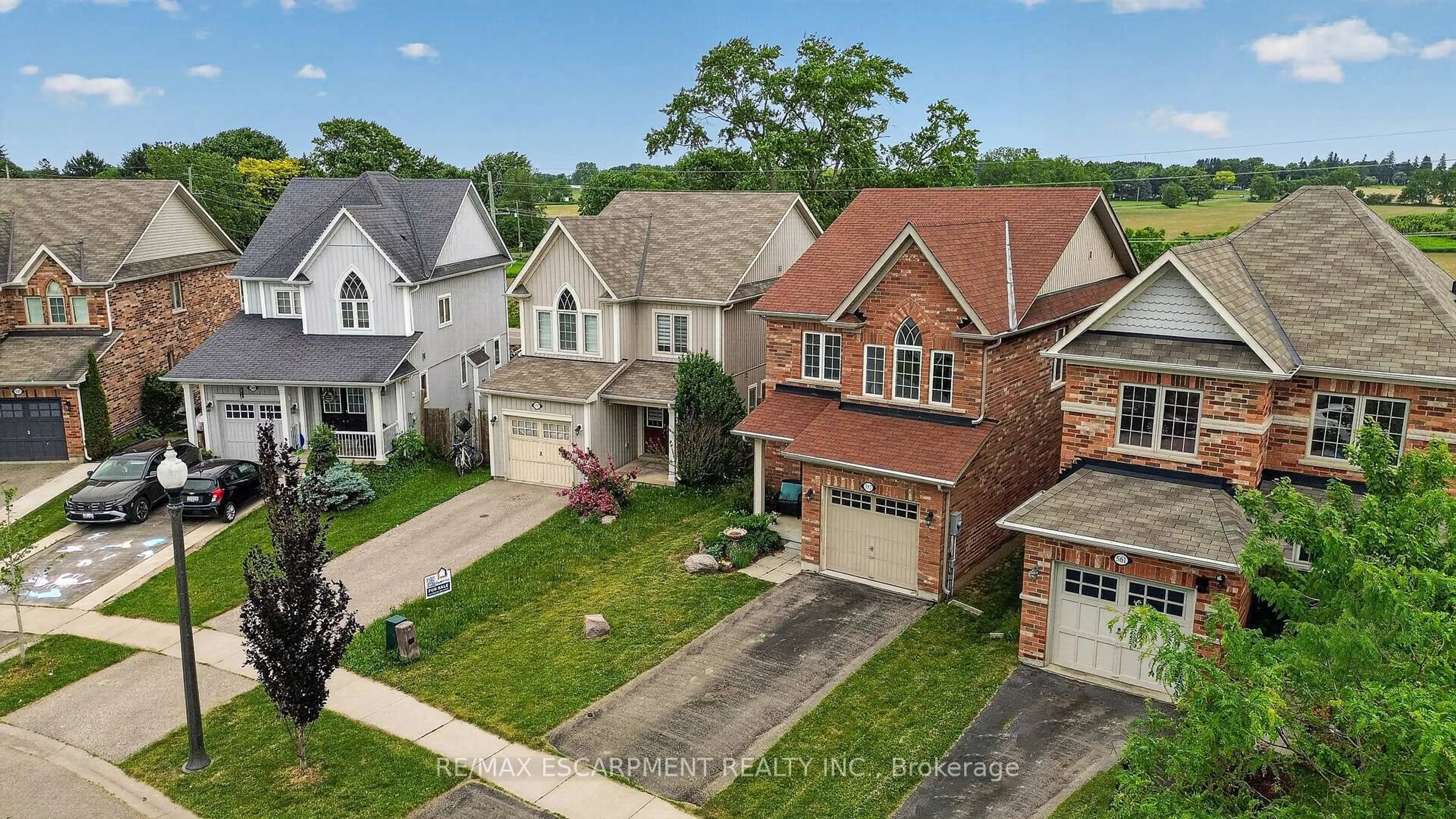 A pic from outside/outdoor area/front of a property/back of a property/a pic from drone, street for 557 Baldwin Cres, Woodstock Ontario N4S 7W2