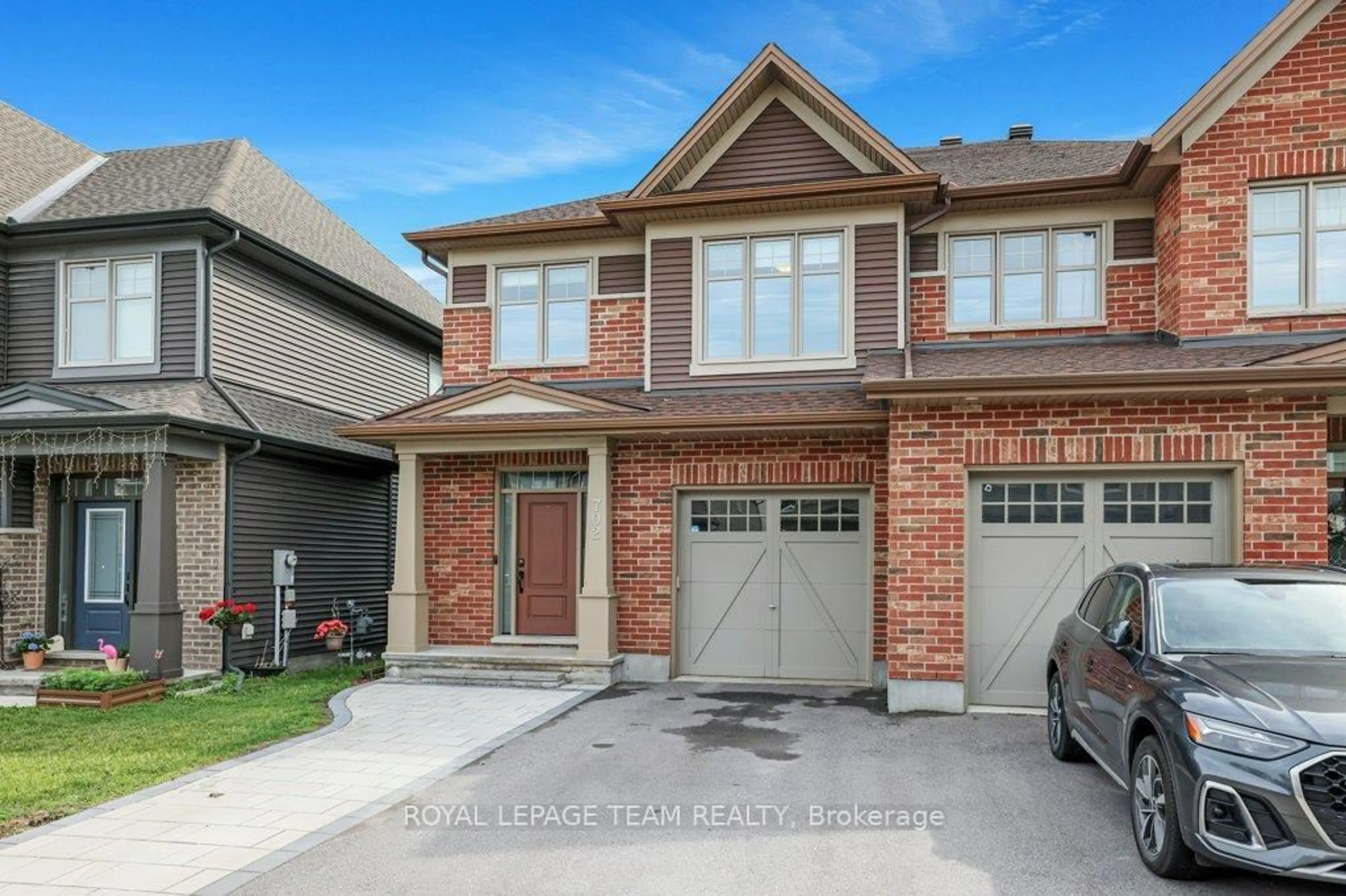 Home with brick exterior material, street for 702 Vivera Pl, Ottawa Ontario K2S 2M8