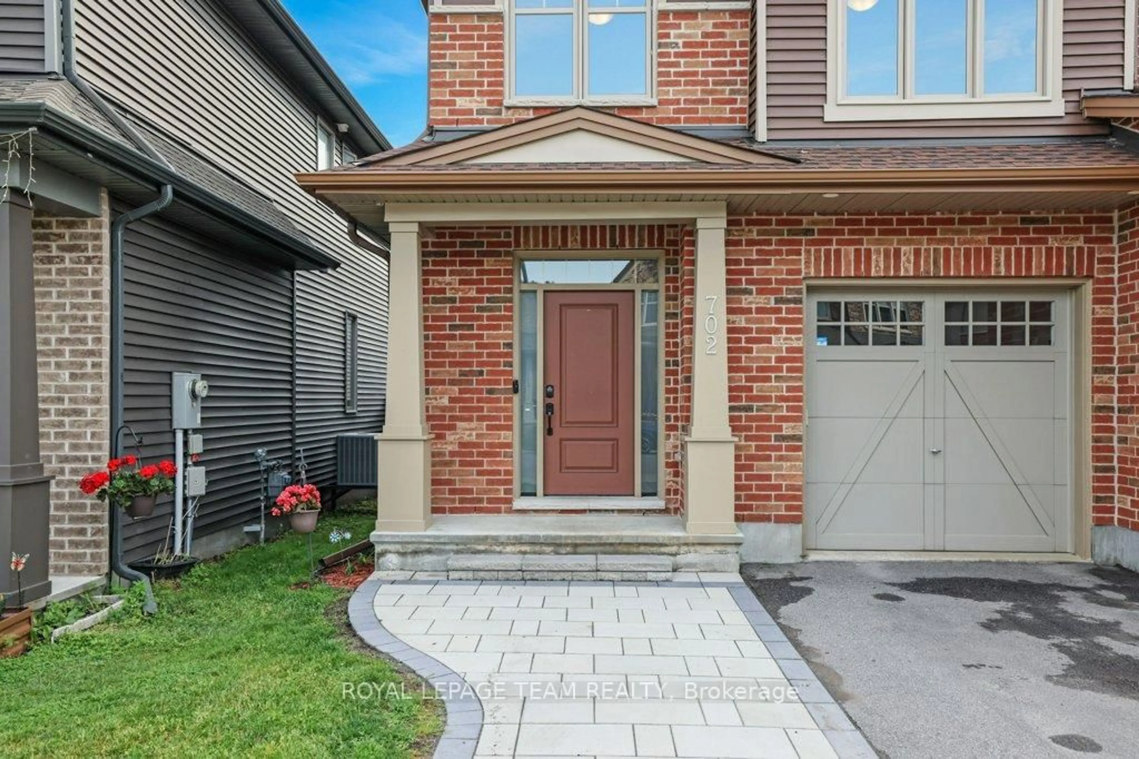 Home with brick exterior material, street for 702 Vivera Pl, Ottawa Ontario K2S 2M8
