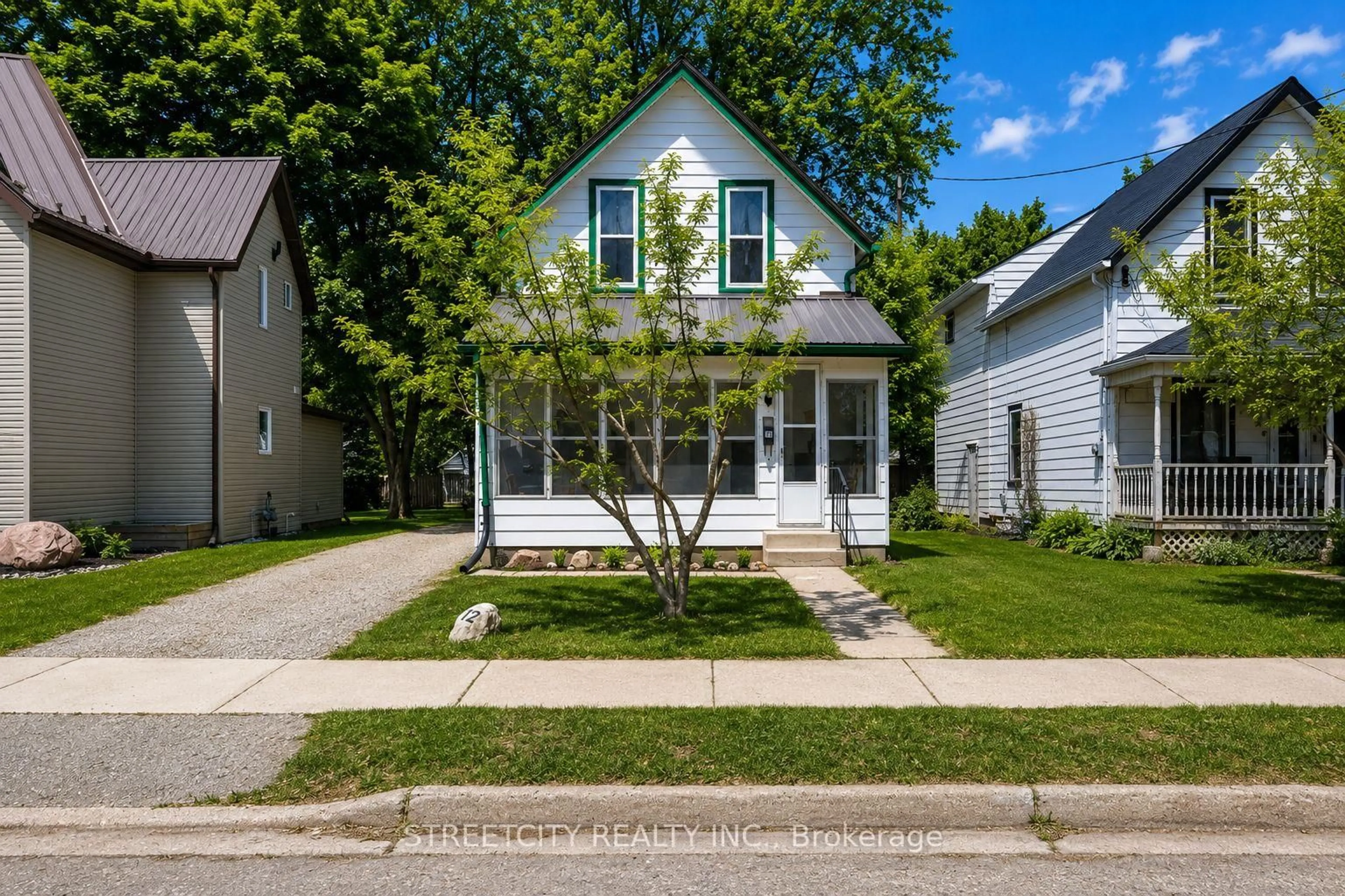 Home with vinyl exterior material, street for 12 Pearl St, Tillsonburg Ontario N4G 1L3