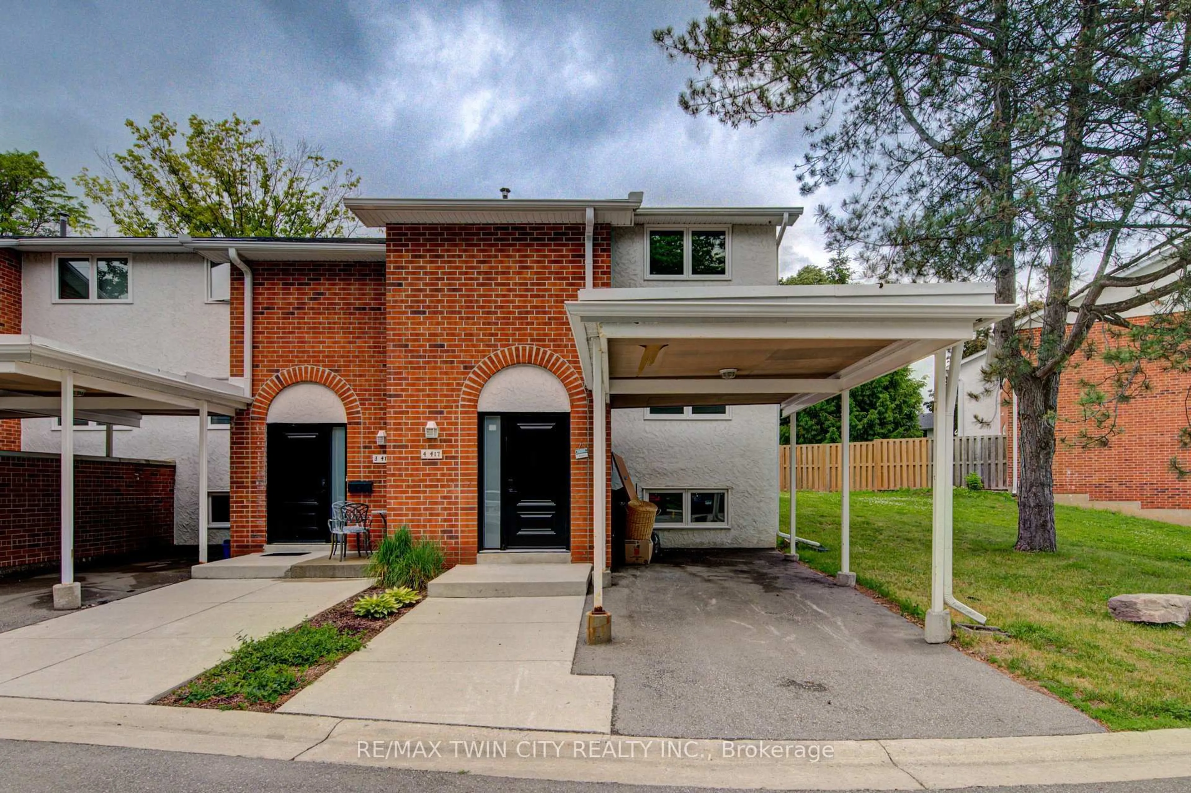 Home with brick exterior material, street for 417 Keats Way #4, Waterloo Ontario N2L 5S7