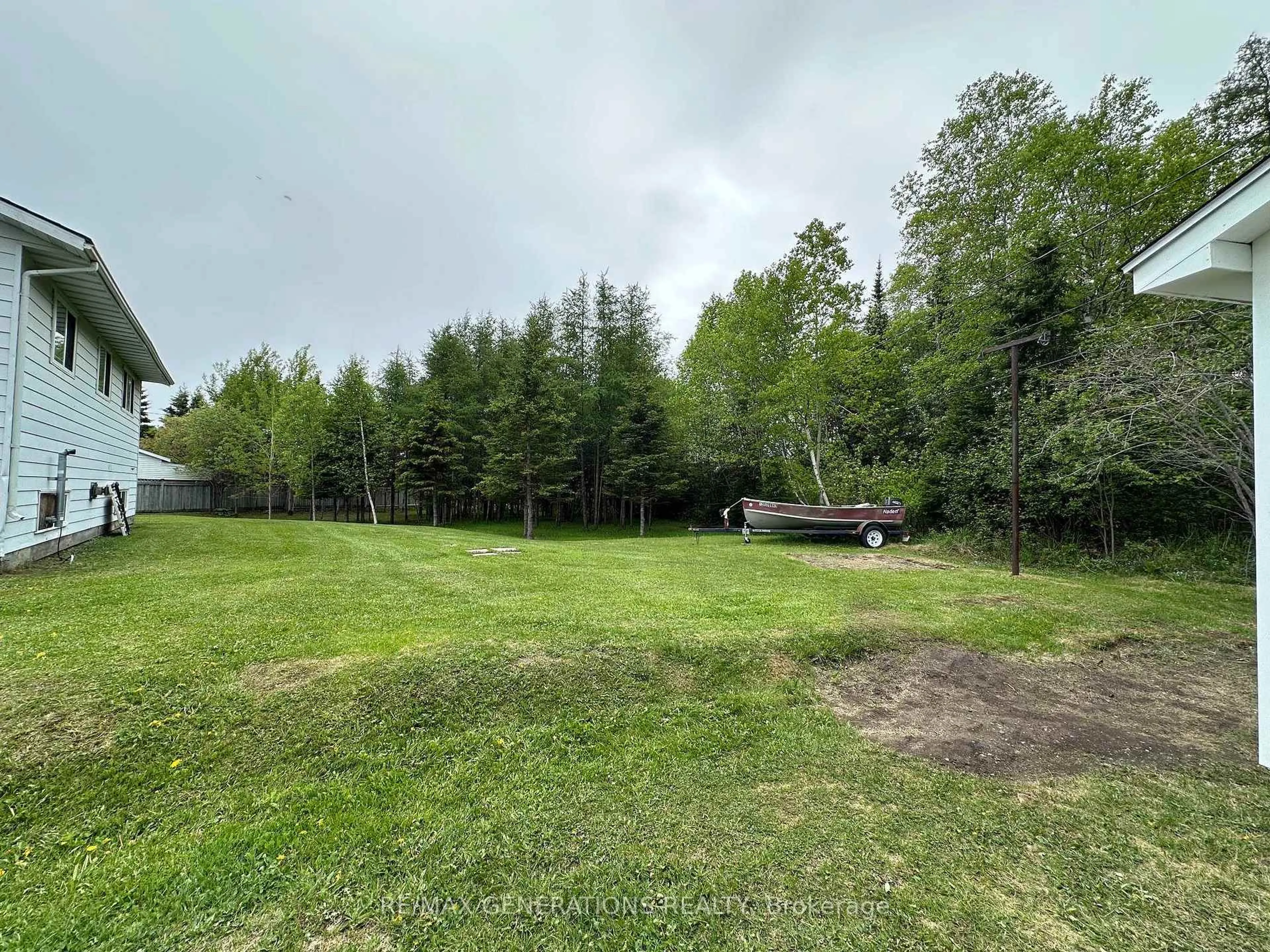 A pic from outside/outdoor area/front of a property/back of a property/a pic from drone, forest/trees view for 8 TERRACE Crt, Terrace Bay Ontario P0T 2W0