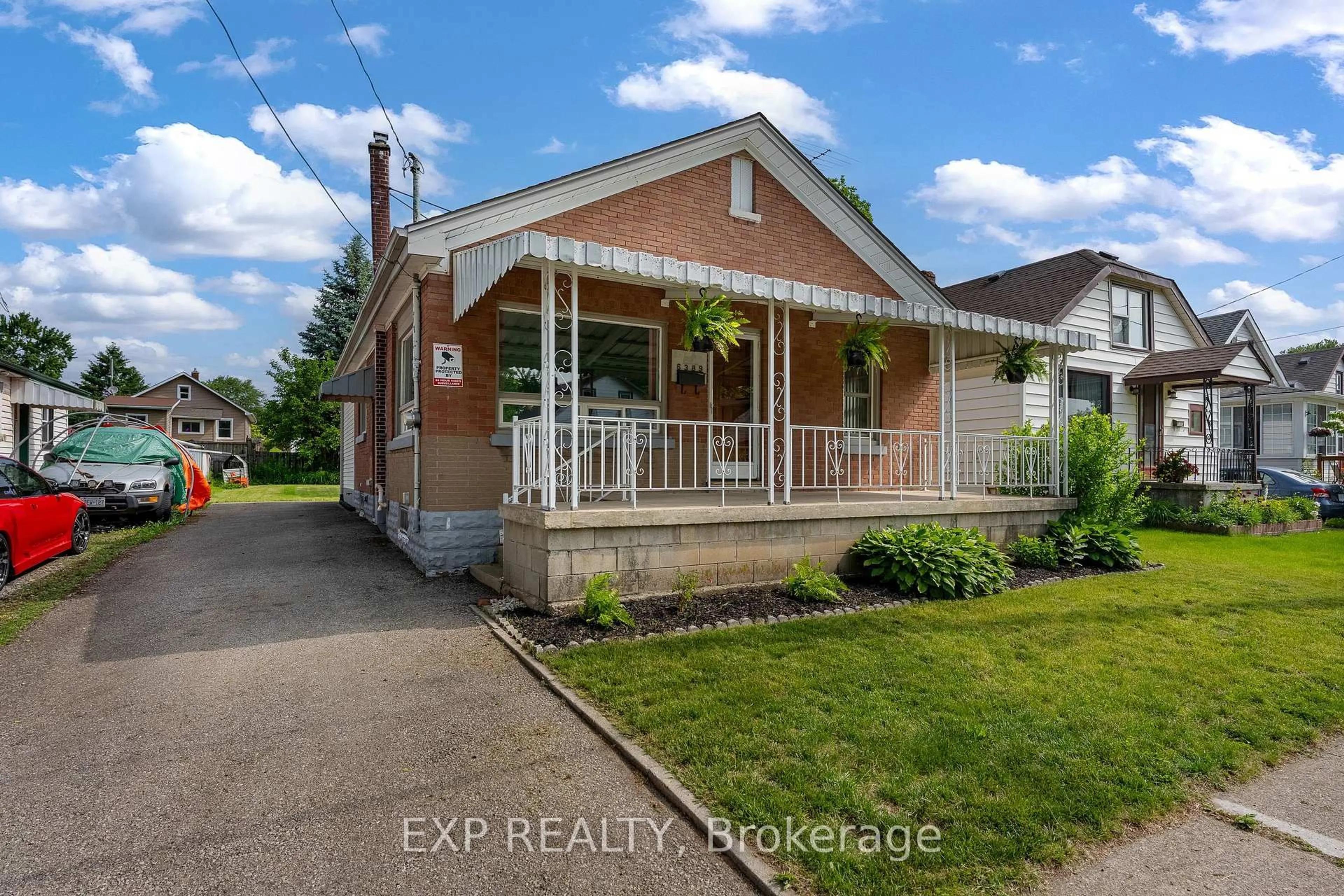 Home with brick exterior material, street for 6389 Monroe St, Niagara Falls Ontario L2G 2G9
