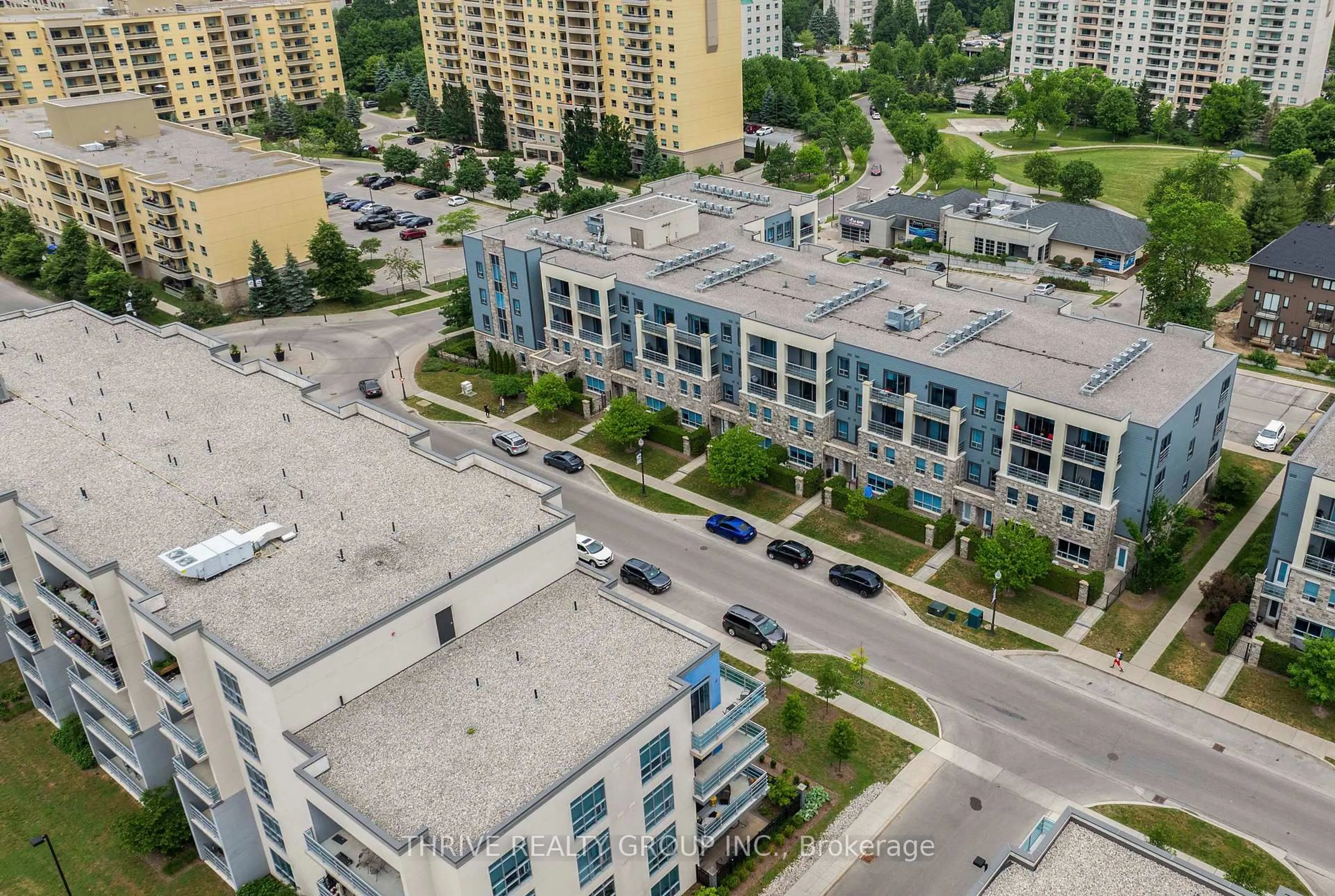 A pic from outside/outdoor area/front of a property/back of a property/a pic from drone, city buildings view from balcony for 340 Sugarcreek Tr #105, London North Ontario N6H 0G4