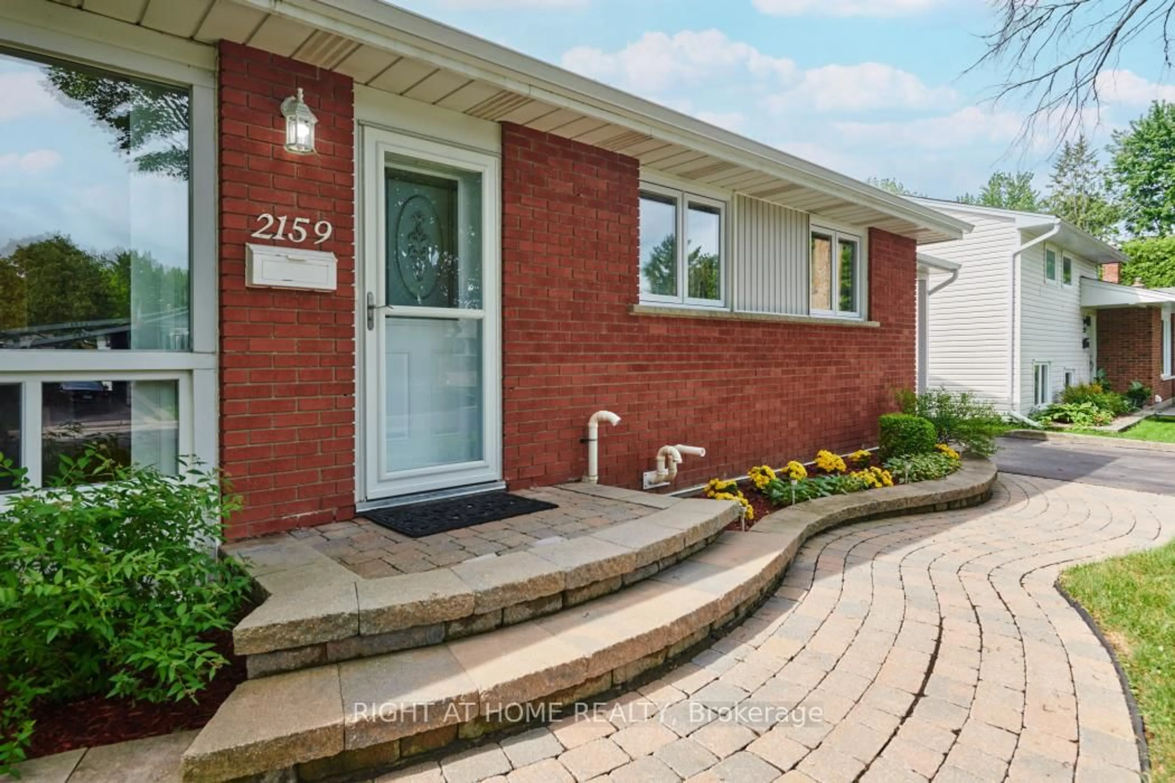 Home with brick exterior material, street for 2159 Monson Cres, Ottawa Ontario K1J 6A7