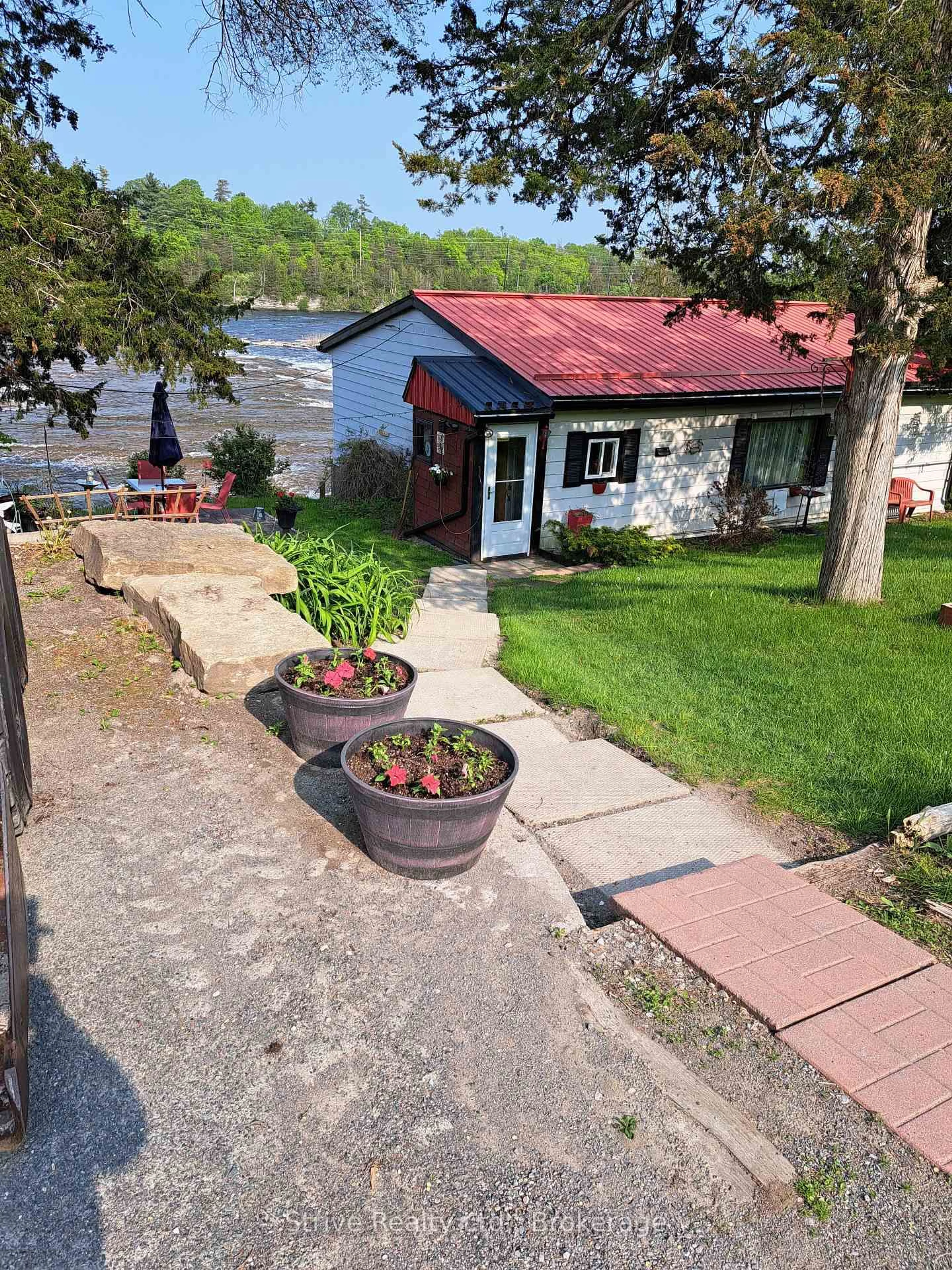 A pic from outside/outdoor area/front of a property/back of a property/a pic from drone, street for 6613 County Rd 50 Rd, Trent Hills Ontario K0L 1L0