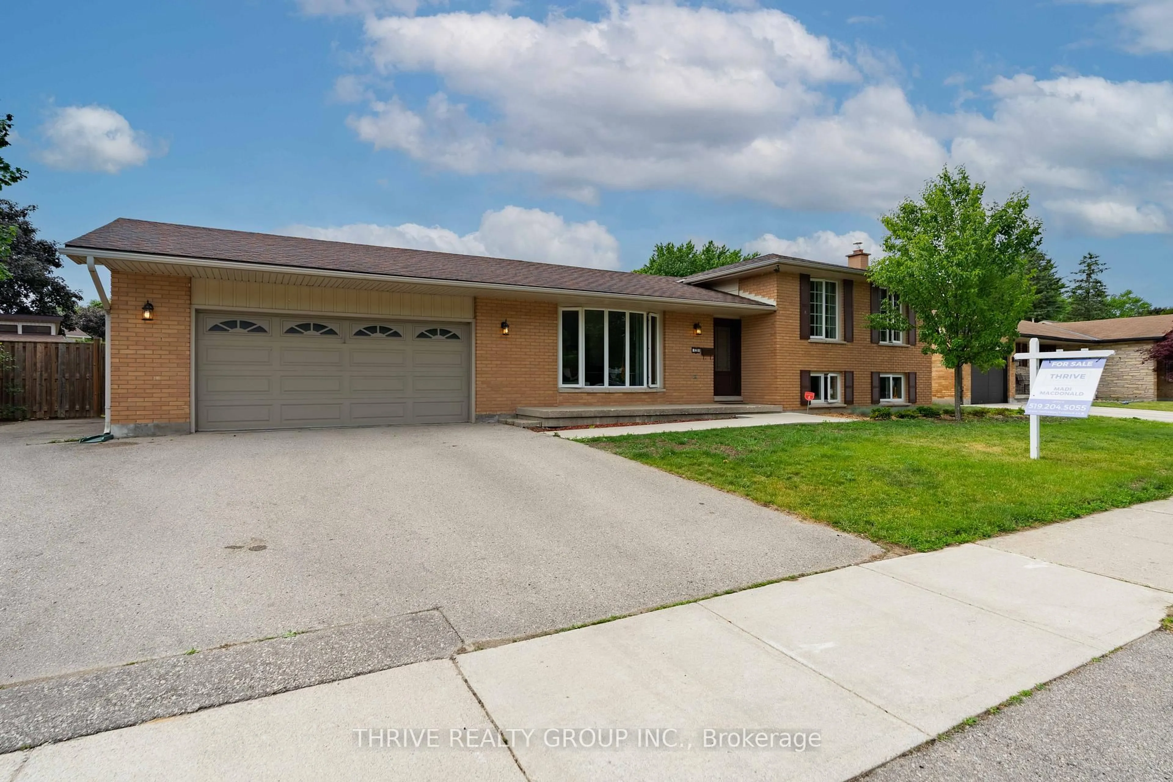 Home with brick exterior material, street for 720 Grenfell Dr, London North Ontario N5X 2C5