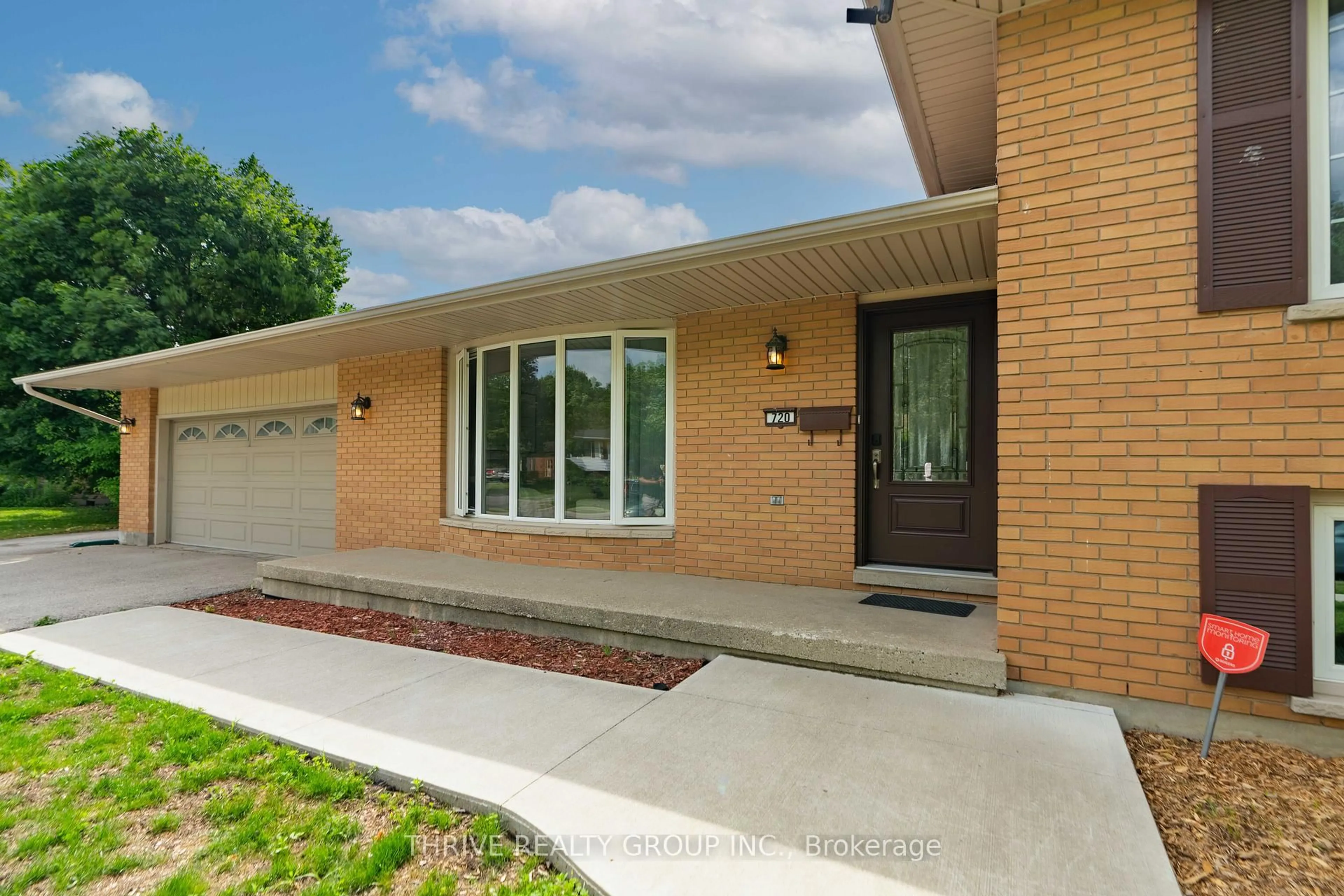 Home with brick exterior material, street for 720 Grenfell Dr, London North Ontario N5X 2C5