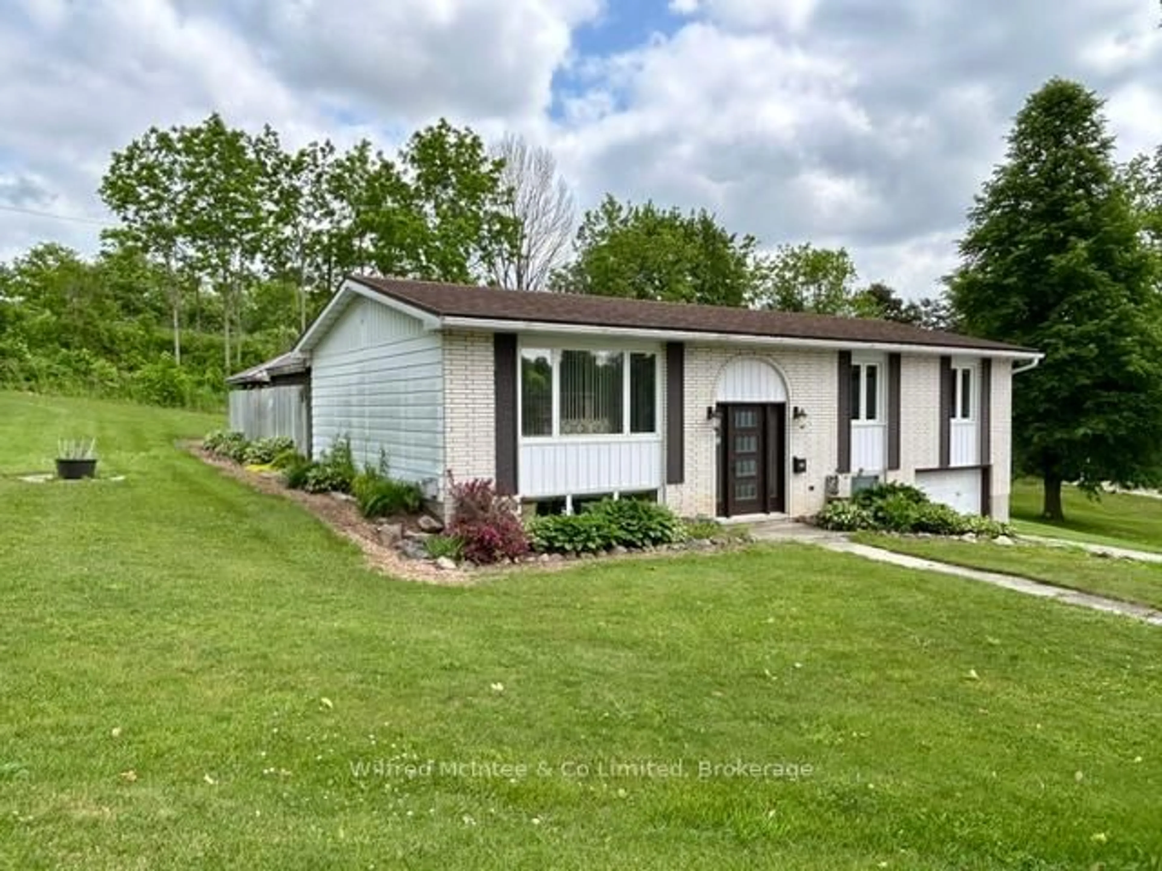 Home with vinyl exterior material, street for 925 Old Durham Rd, Brockton Ontario N0G 2V0