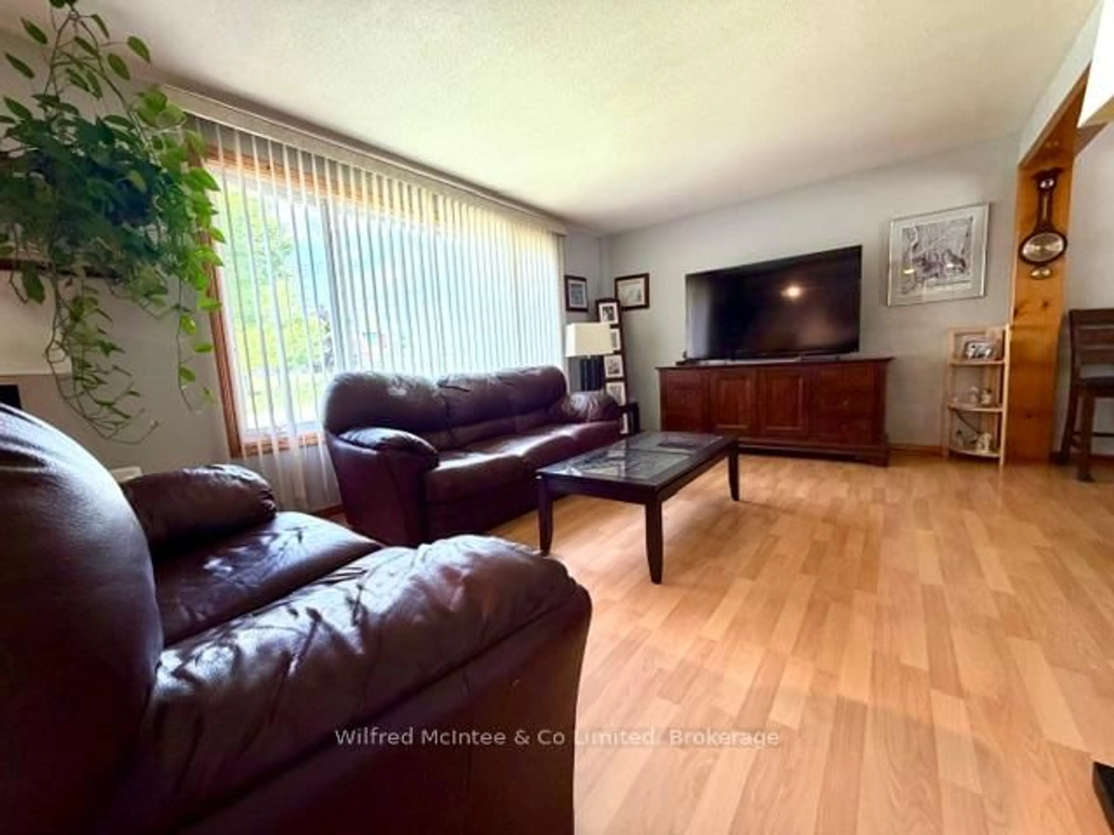 Living room with furniture, wood/laminate floor for 925 Old Durham Rd, Brockton Ontario N0G 2V0