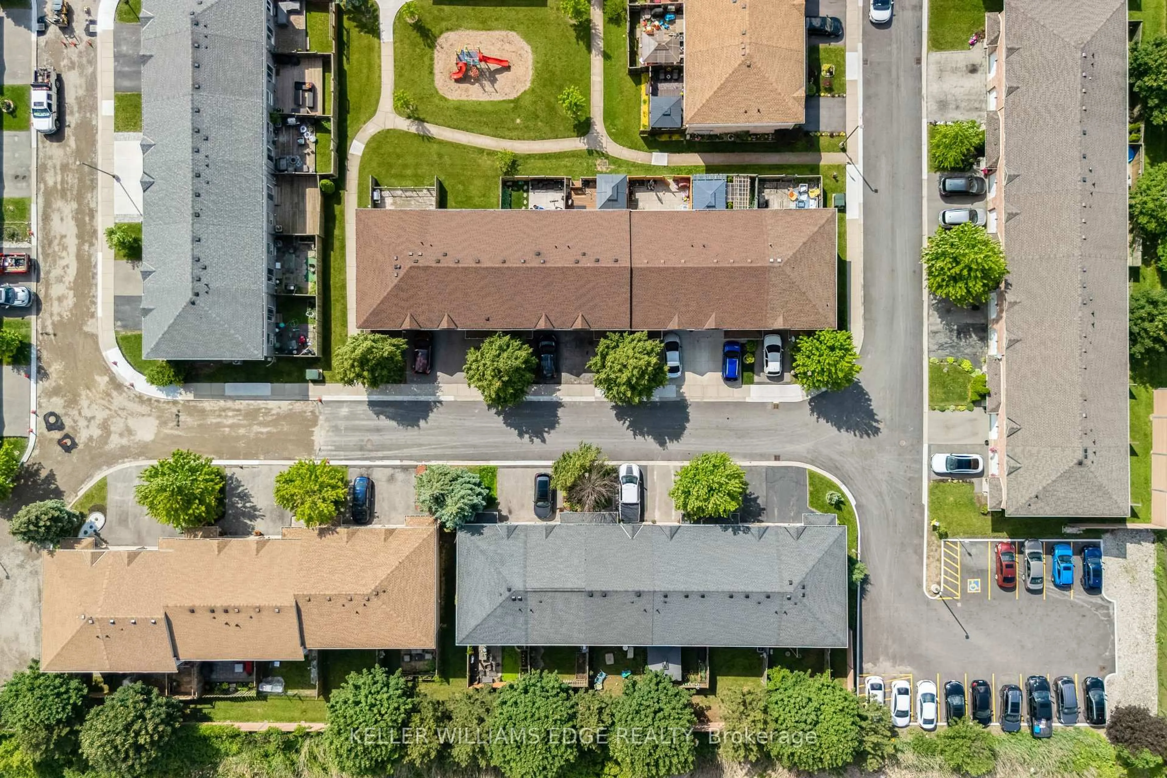 A pic from outside/outdoor area/front of a property/back of a property/a pic from drone, street for 39 Pinewoods Dr #35, Hamilton Ontario L8J 3Z4