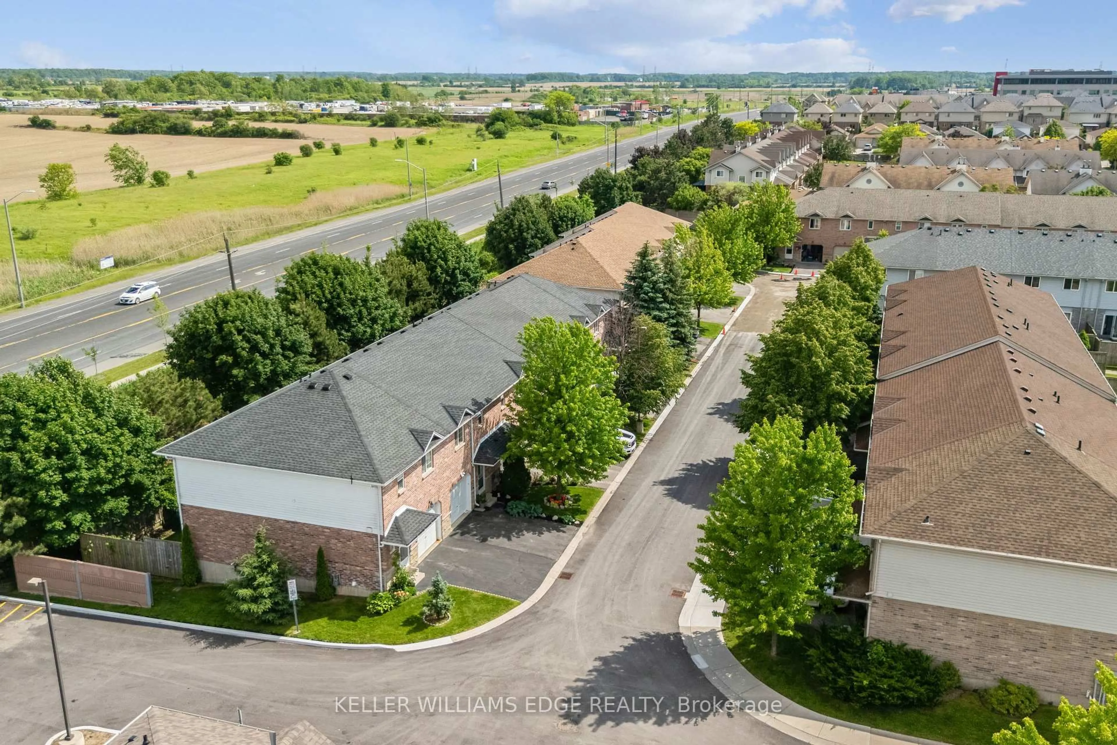 A pic from outside/outdoor area/front of a property/back of a property/a pic from drone, street for 39 Pinewoods Dr #35, Hamilton Ontario L8J 3Z4