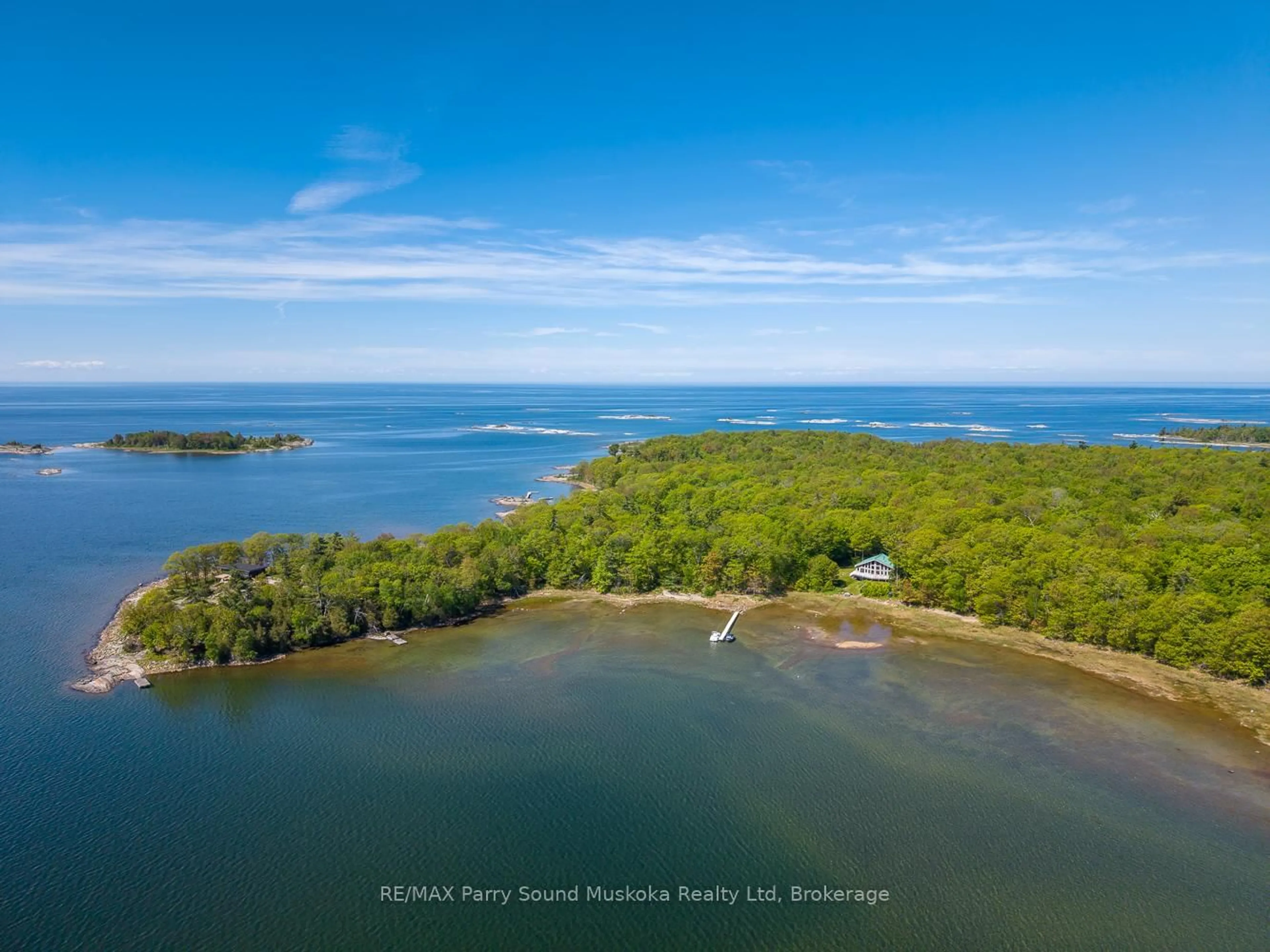A pic from outside/outdoor area/front of a property/back of a property/a pic from drone, water/lake/river/ocean view for 53 Sandy Island, The Archipelago Ontario P2A 2W8