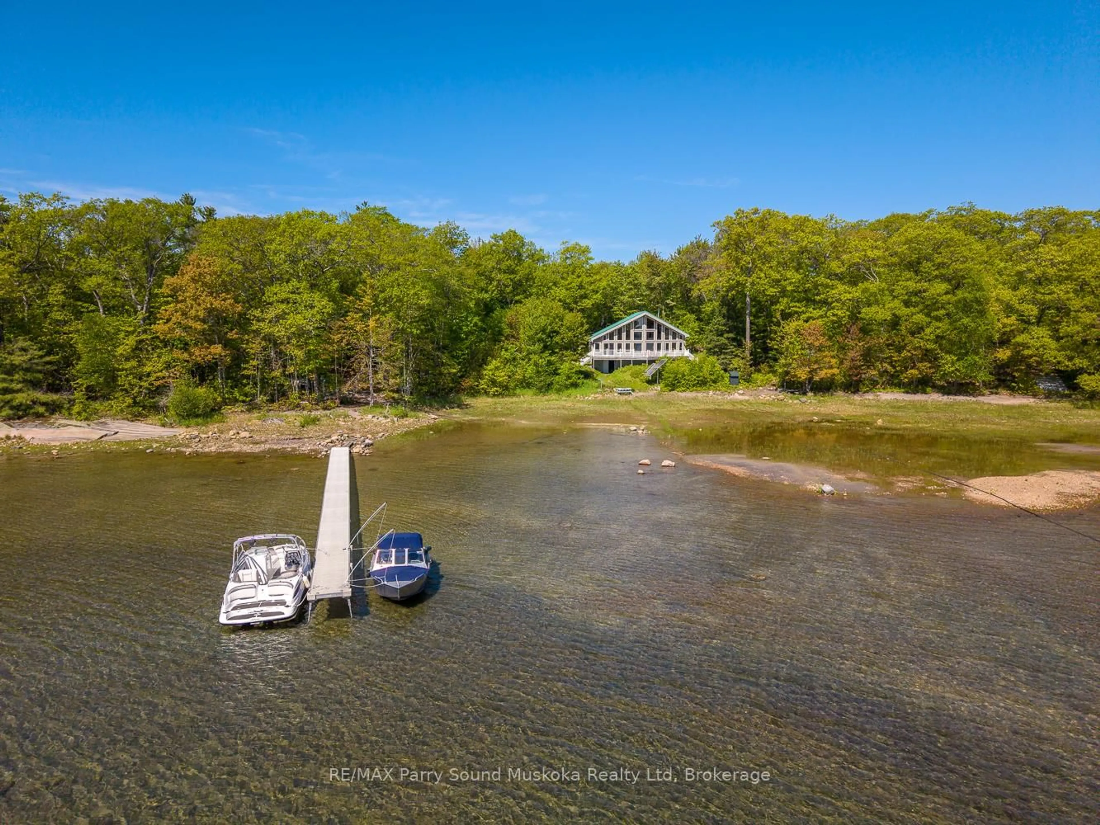 A pic from outside/outdoor area/front of a property/back of a property/a pic from drone, water/lake/river/ocean view for 53 Sandy Island, The Archipelago Ontario P2A 2W8