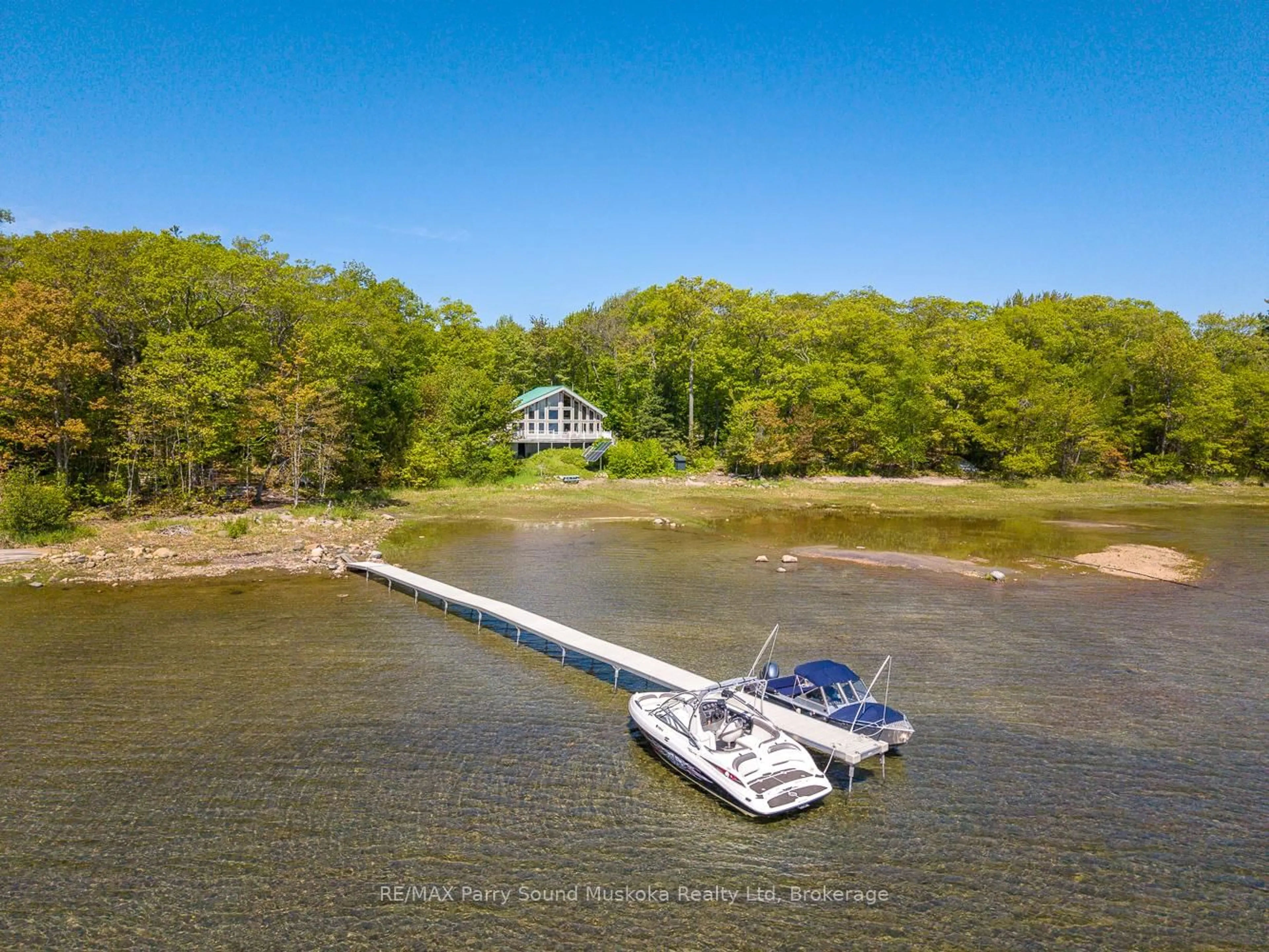 A pic from outside/outdoor area/front of a property/back of a property/a pic from drone, water/lake/river/ocean view for 53 Sandy Island, The Archipelago Ontario P2A 2W8