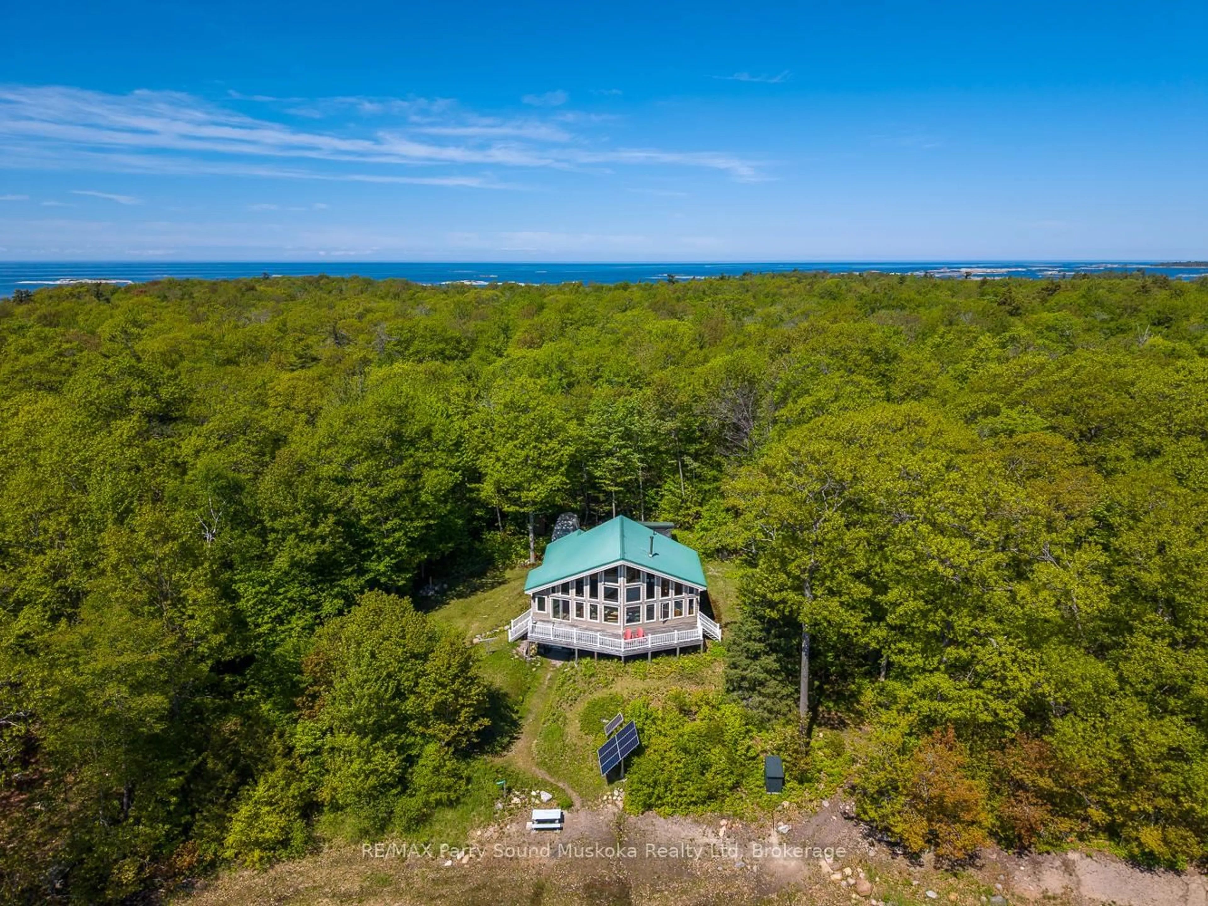 A pic from outside/outdoor area/front of a property/back of a property/a pic from drone, water/lake/river/ocean view for 53 Sandy Island, The Archipelago Ontario P2A 2W8