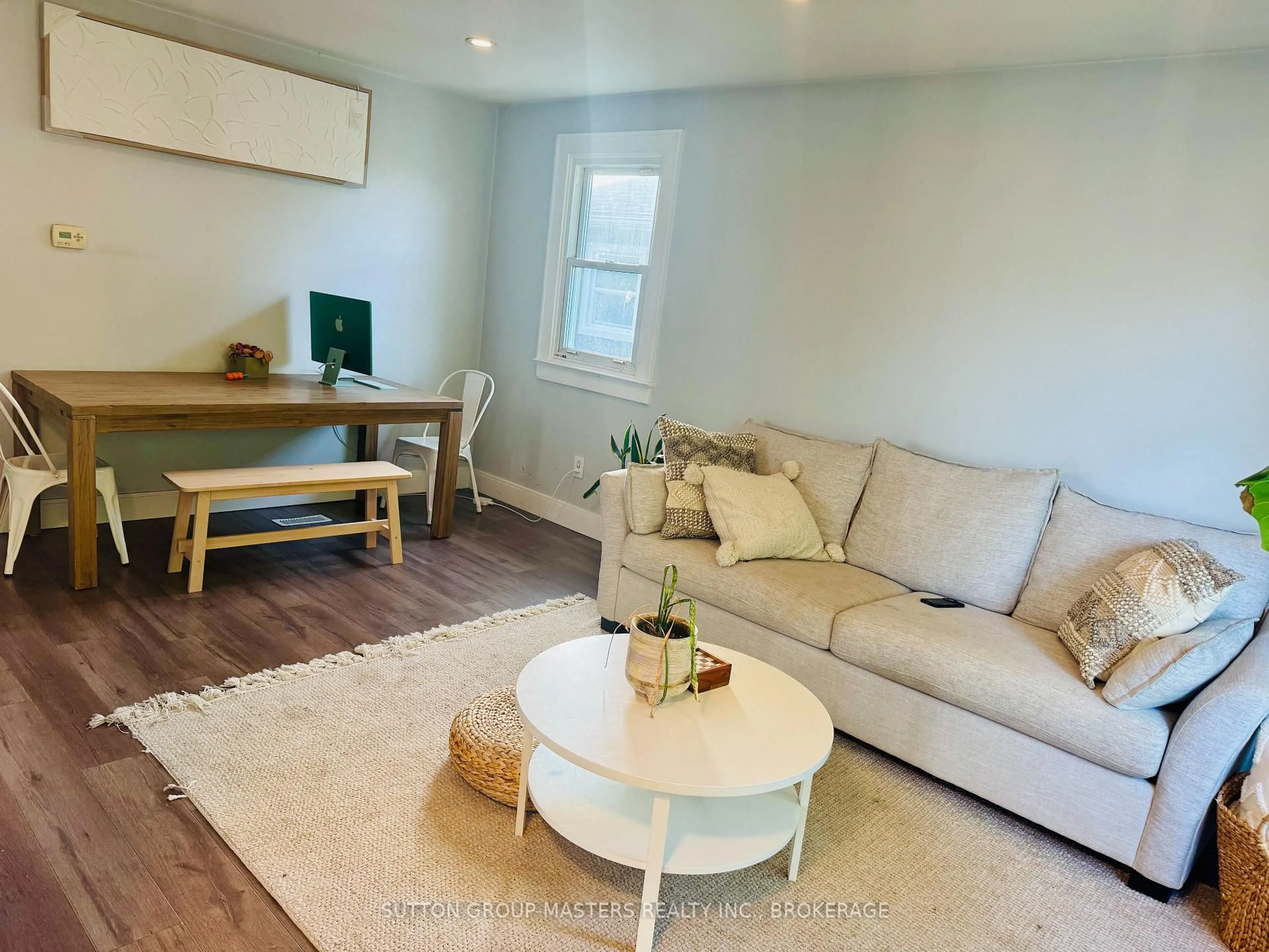 Living room with furniture, wood/laminate floor for 808 Victoria St, Kingston Ontario K7K 4T3