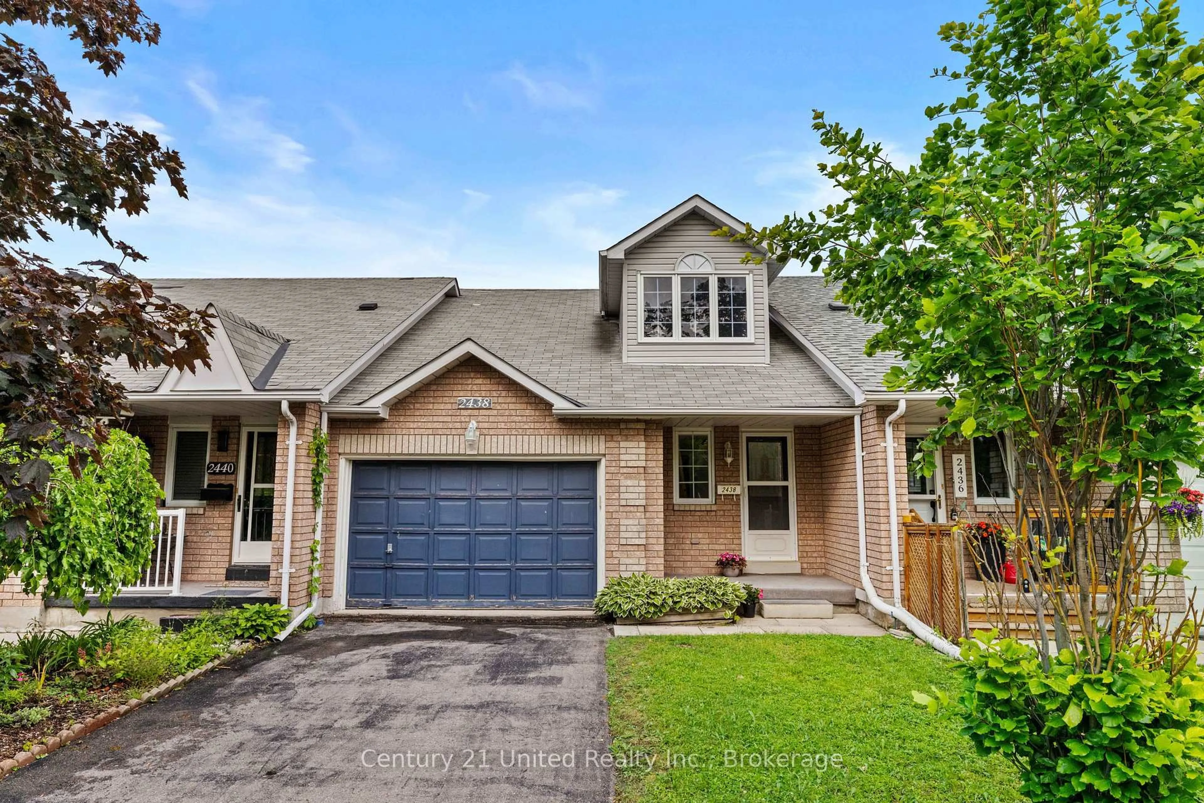 Home with brick exterior material, street for 2438 Woodglade Blvd, Peterborough Ontario K9K 2K9