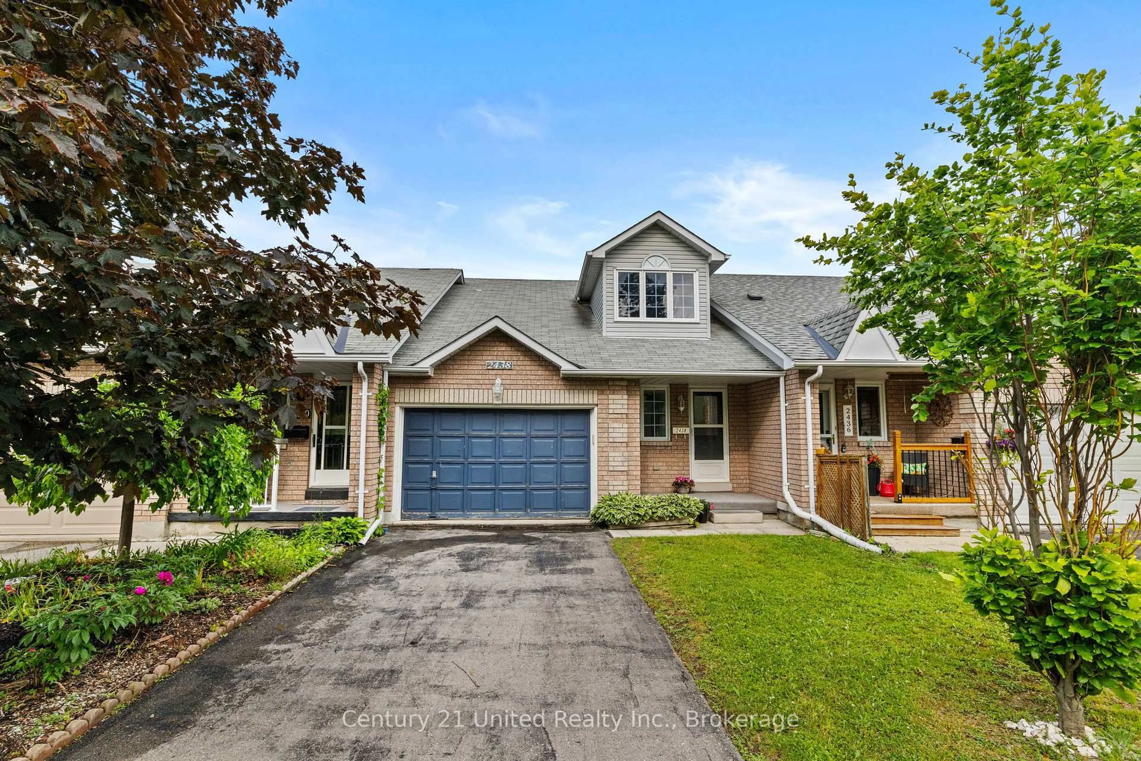 Home with brick exterior material, street for 2438 Woodglade Blvd, Peterborough Ontario K9K 2K9