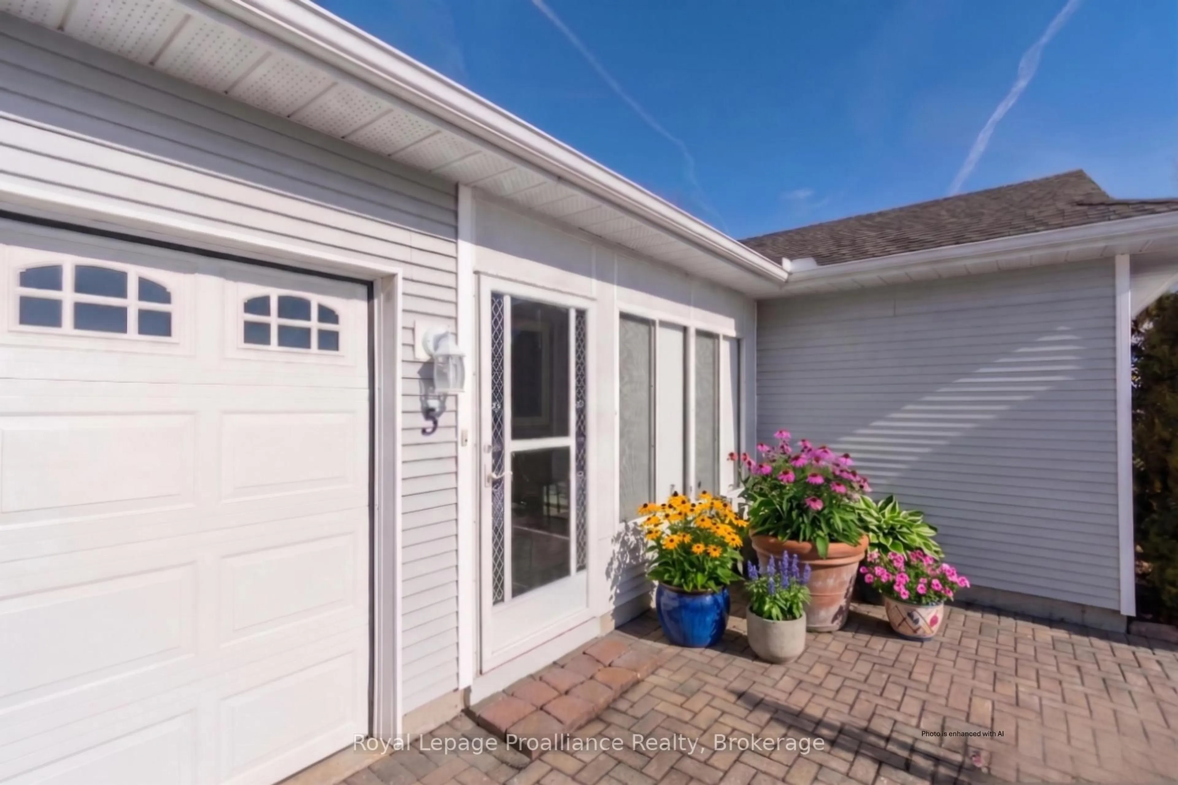 Home with vinyl exterior material, street for 5 Cretney Dr, Prince Edward County Ontario K0K 3L0