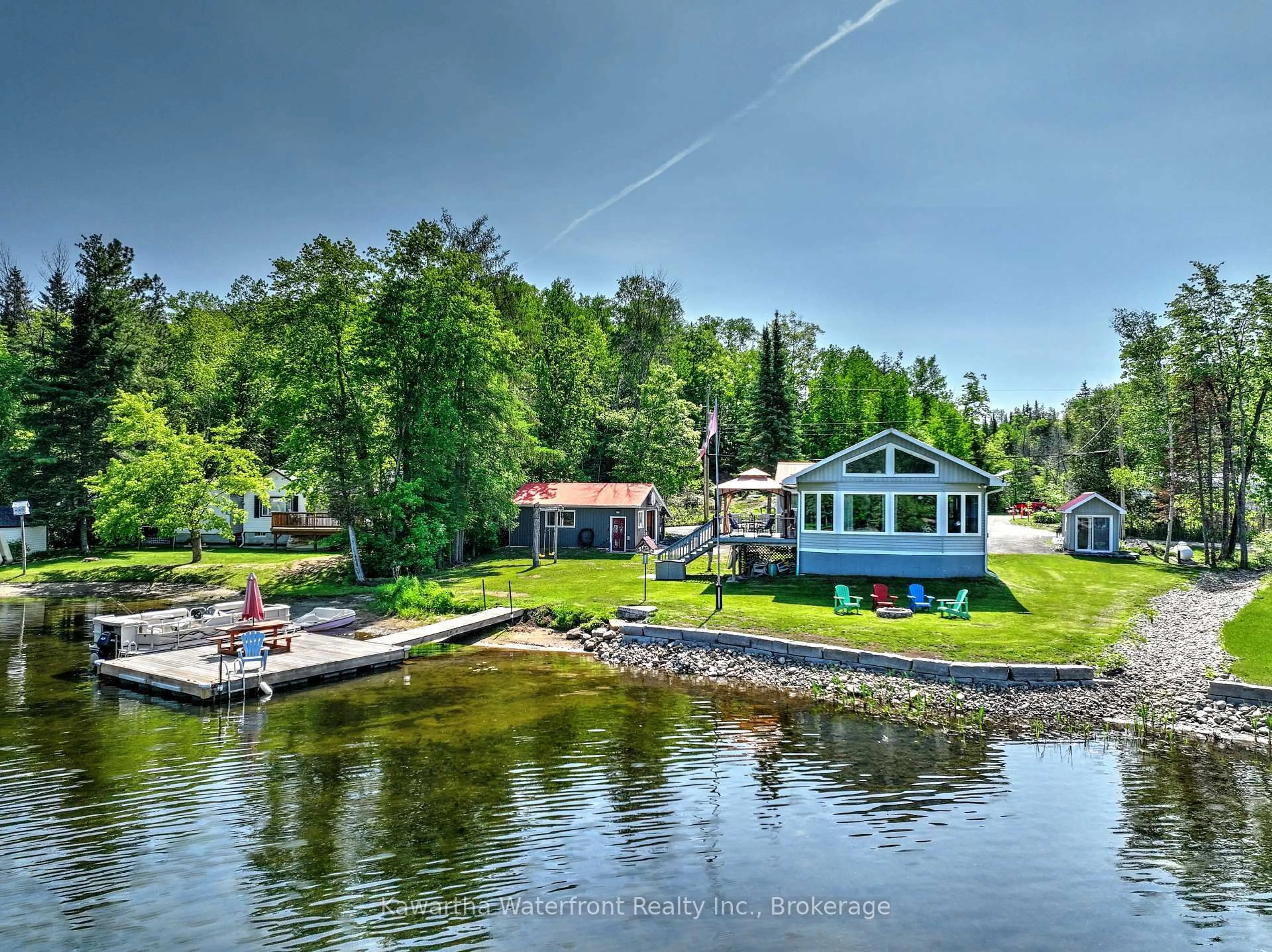 A pic from outside/outdoor area/front of a property/back of a property/a pic from drone, water/lake/river/ocean view for 32 Shadow Lake Road 2 Rd, Kawartha Lakes Ontario K0M 2L0