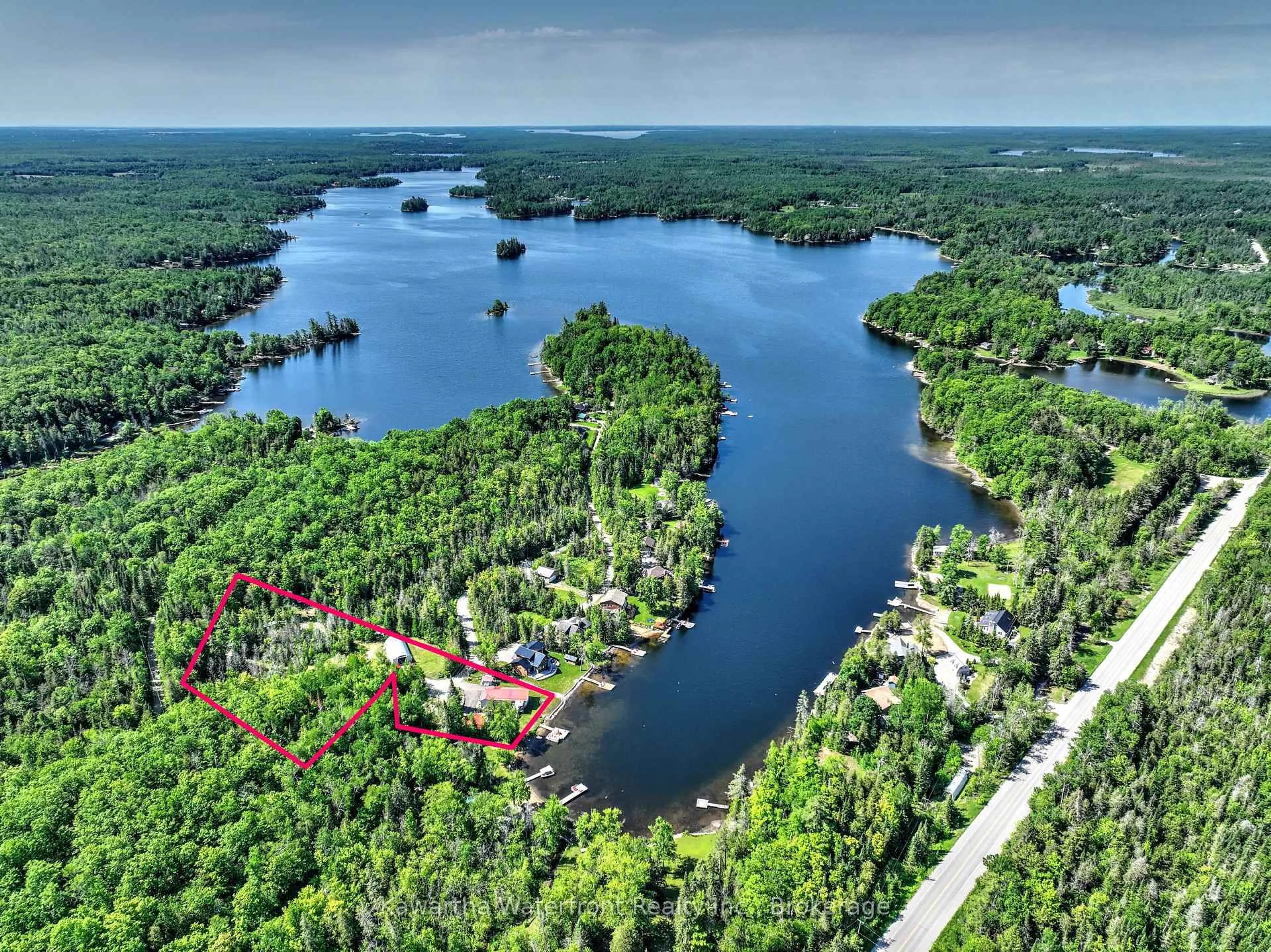 A pic from outside/outdoor area/front of a property/back of a property/a pic from drone, water/lake/river/ocean view for 32 Shadow Lake Road 2 Rd, Kawartha Lakes Ontario K0M 2L0