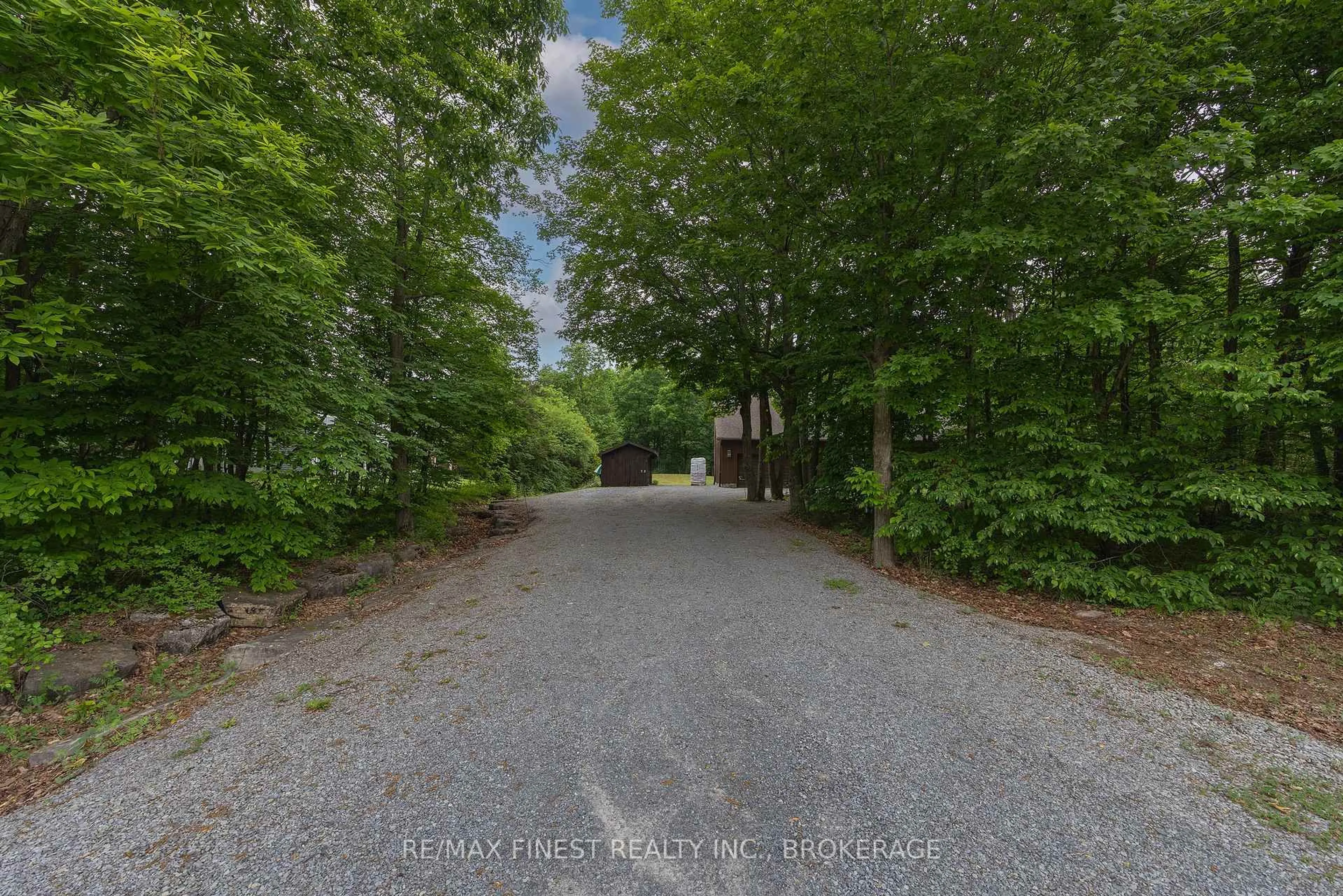 A pic from outside/outdoor area/front of a property/back of a property/a pic from drone, street for 3886 Holmes Rd, Inverary Ontario K0H 1X0