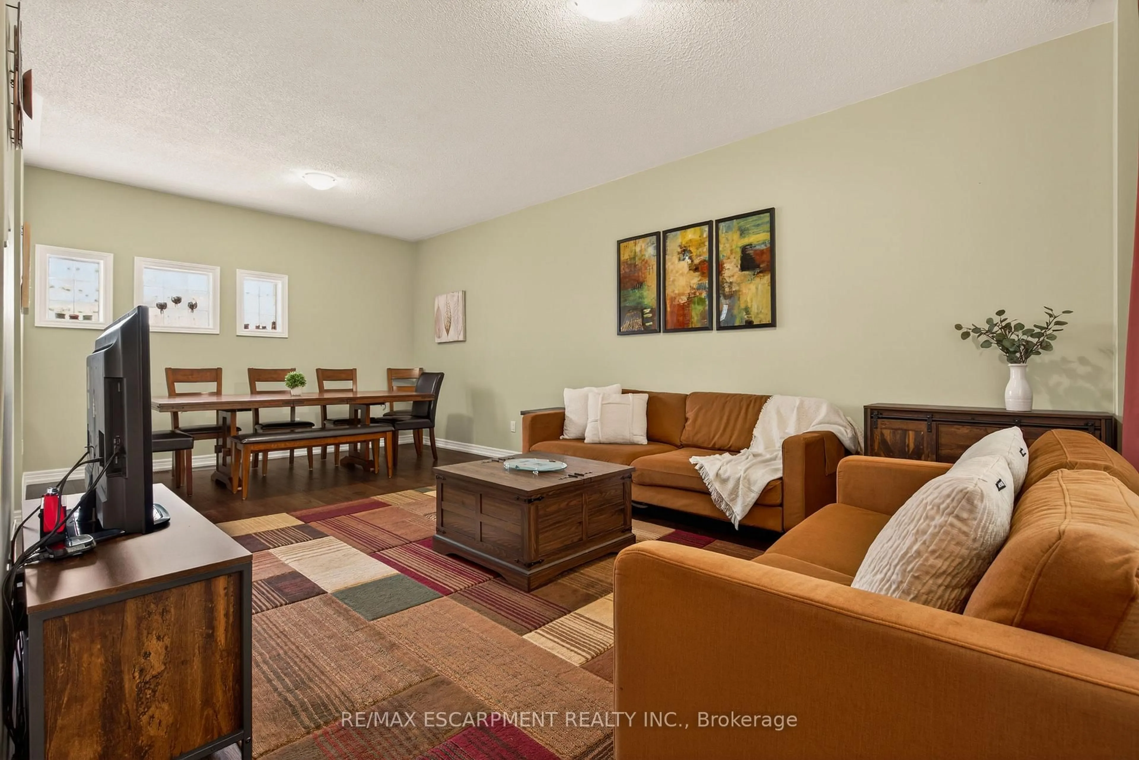Living room with furniture, unknown for 100 Beddoe Dr #20, Hamilton Ontario L8P 4Z2