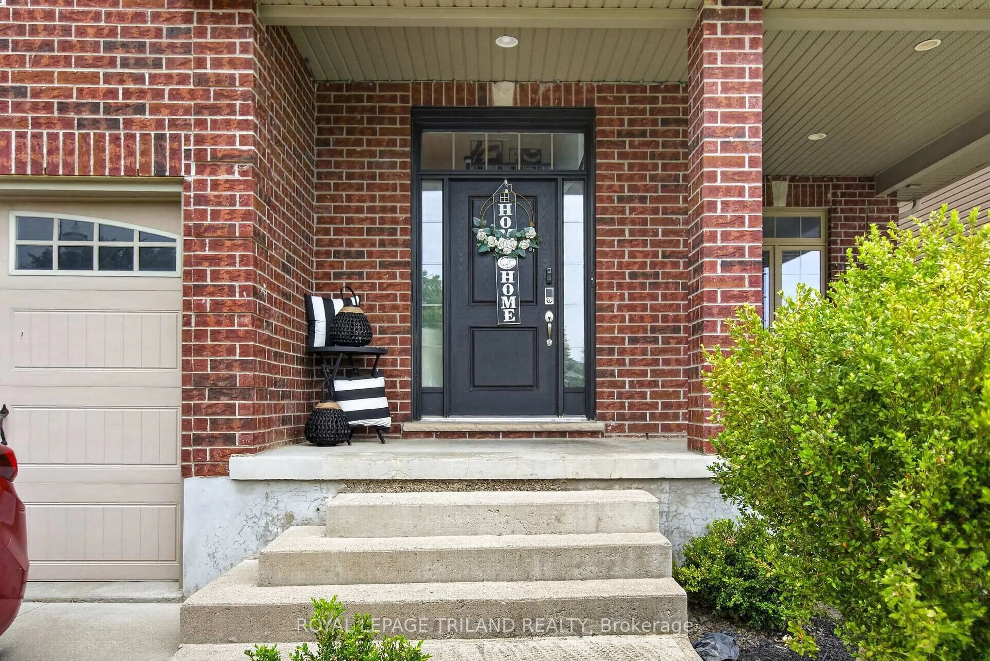Home with brick exterior material, street for 656 Redtail Tr, London North Ontario N6H 5X7