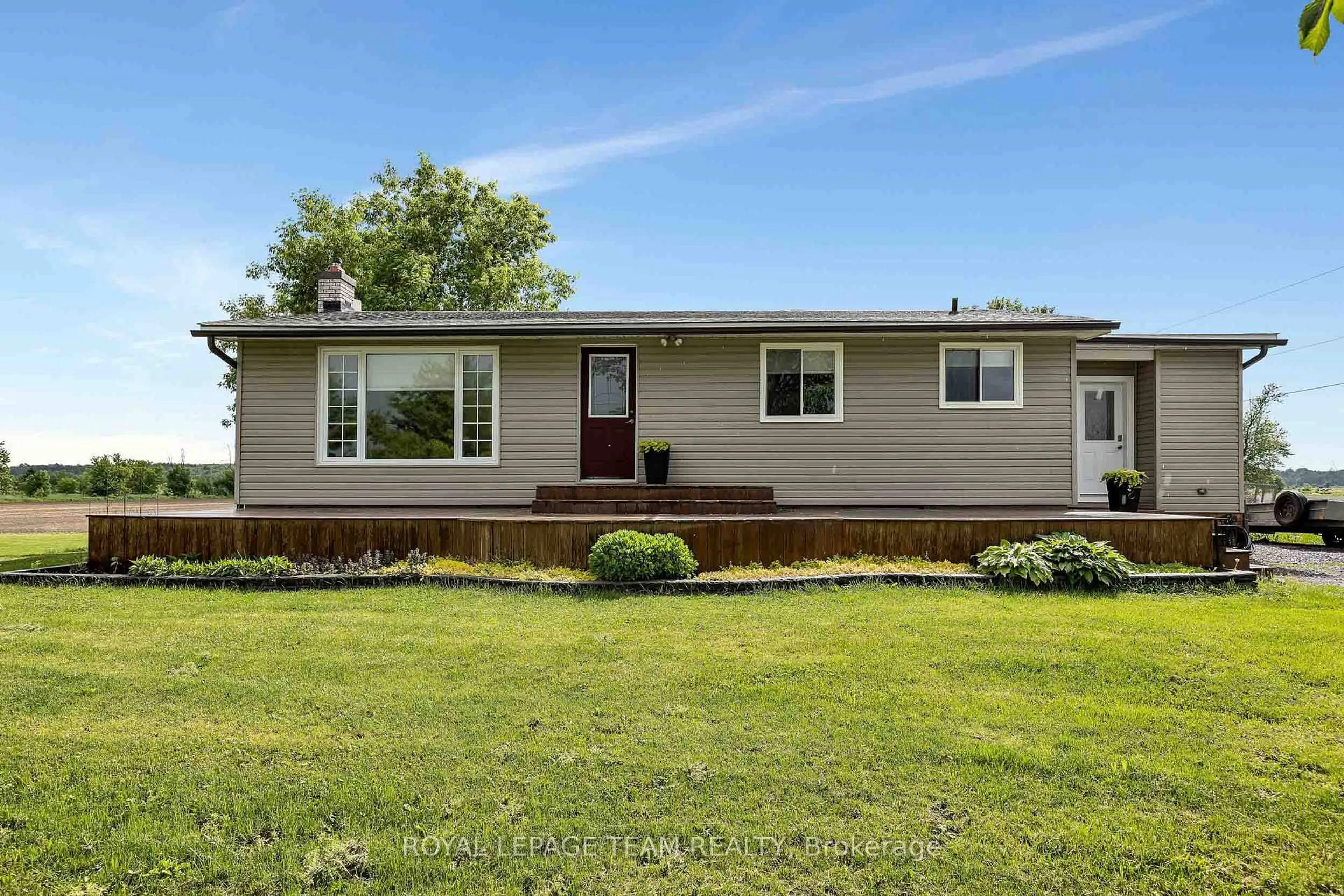 Home with vinyl exterior material, street for 3217 Woodkilton Rd, Ottawa Ontario K0A 1T0