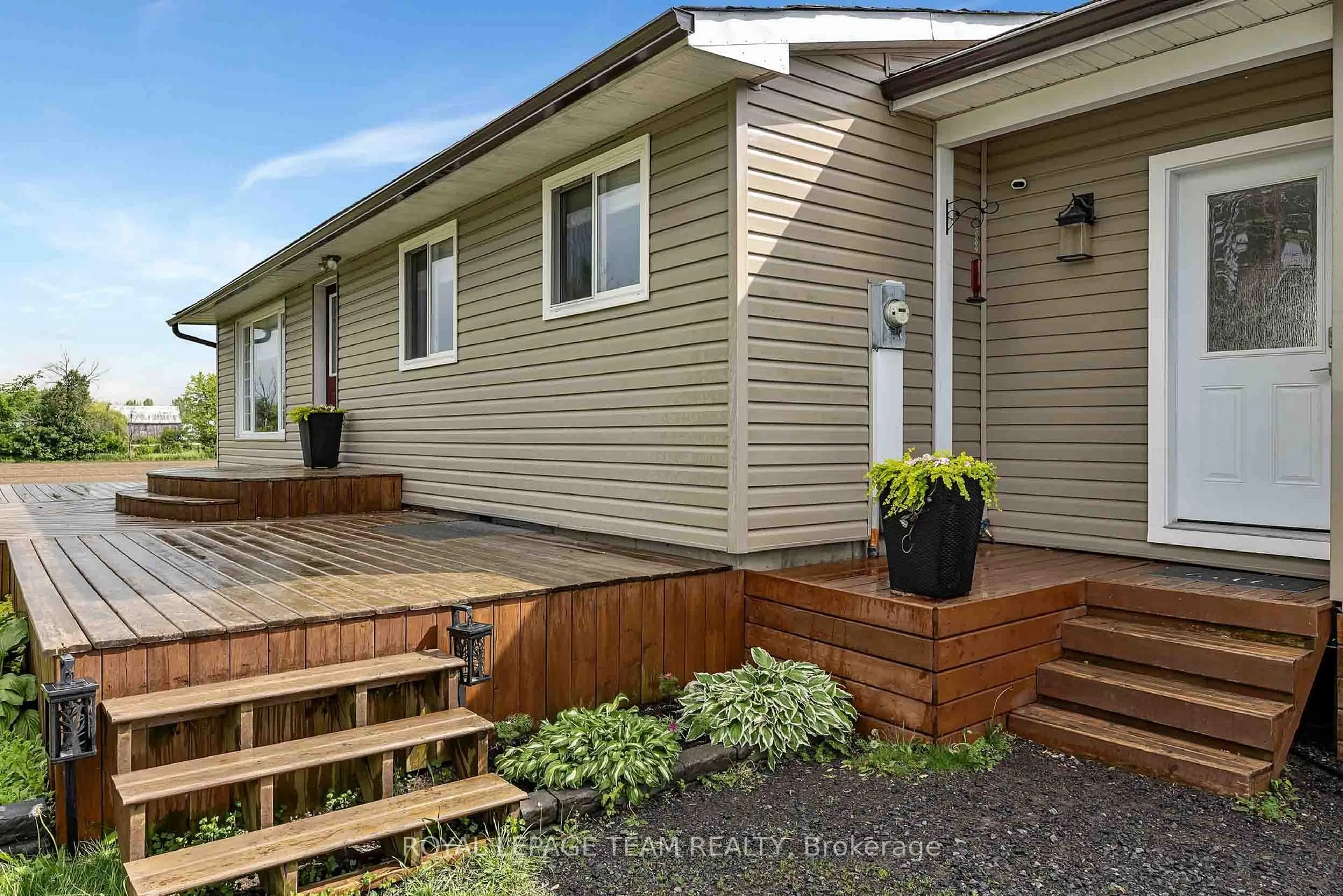 Home with vinyl exterior material, street for 3217 Woodkilton Rd, Ottawa Ontario K0A 1T0