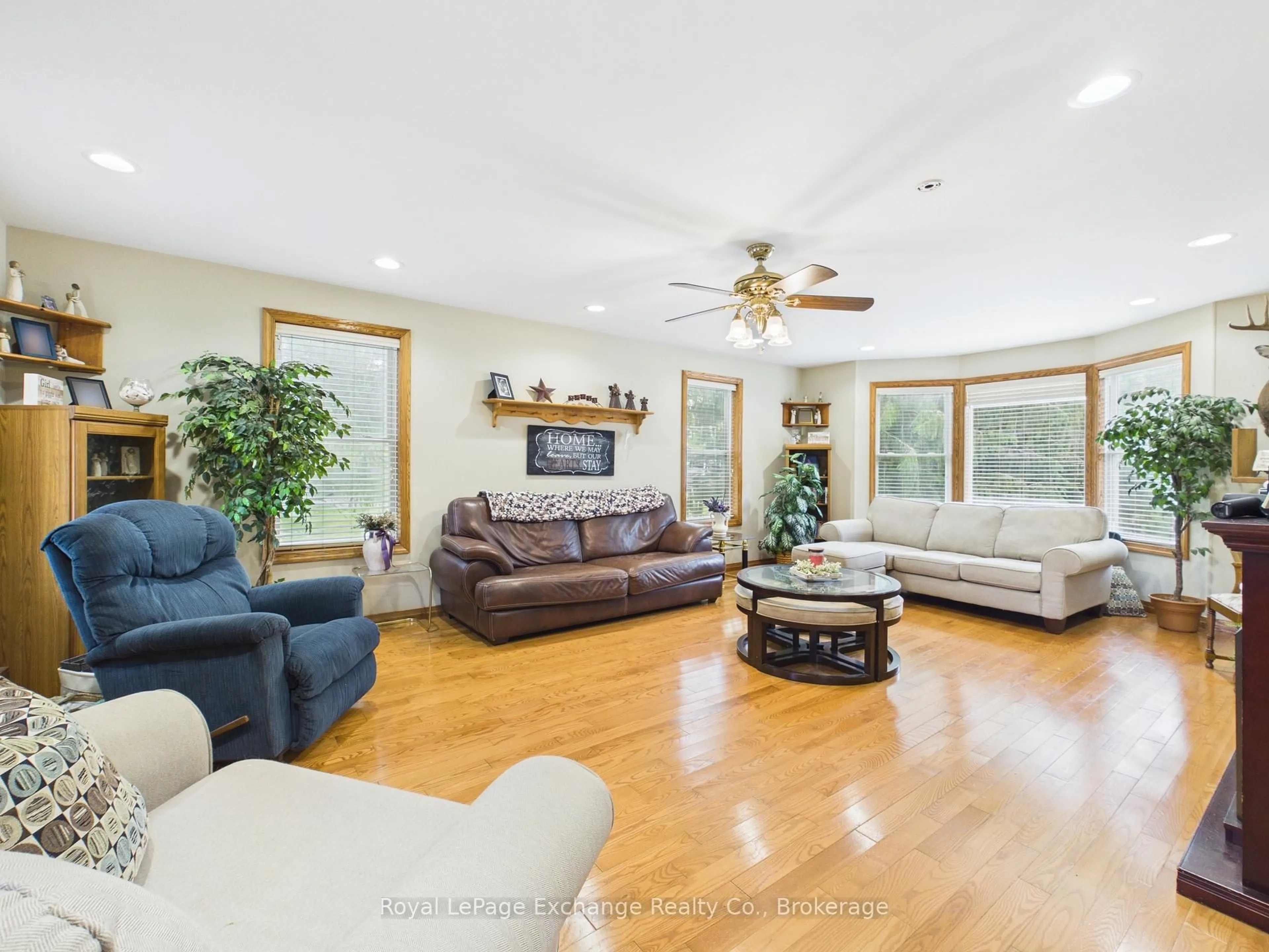 Living room with furniture, wood/laminate floor for 38 Whitechurch St, Huron-Kinloss Ontario N0G 2W0