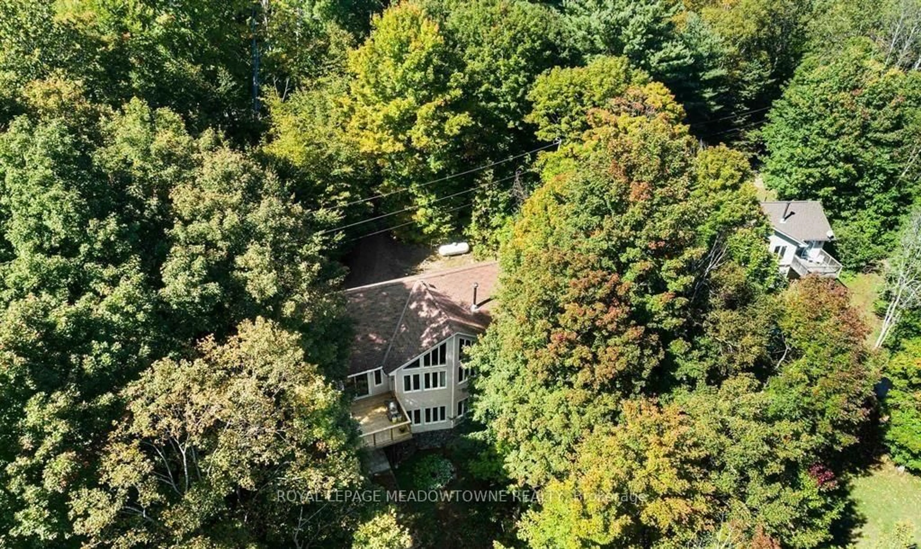 A pic from outside/outdoor area/front of a property/back of a property/a pic from drone, forest/trees view for 1658 Hospitality Rd, Minden Hills Ontario K0M 2K0