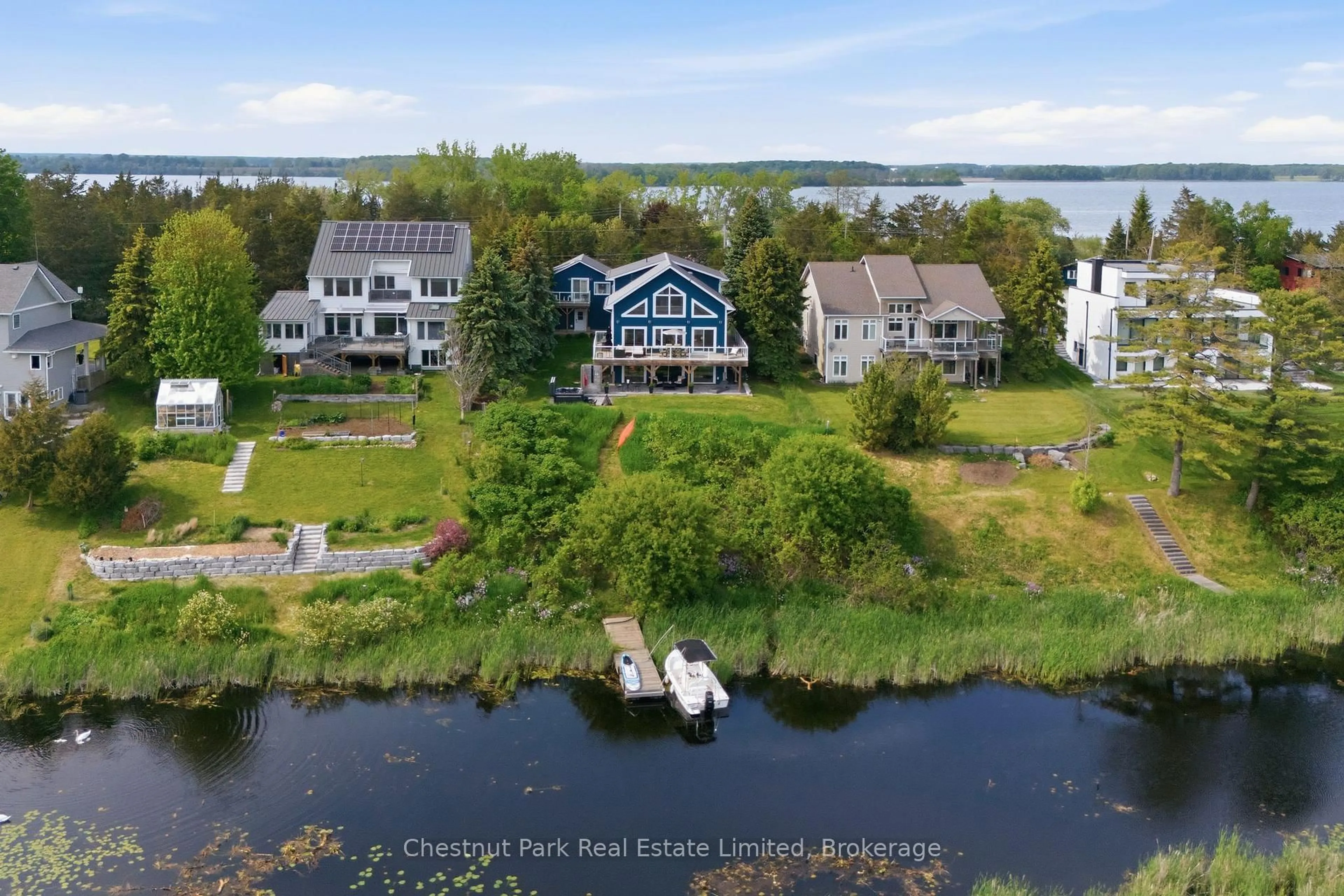 A pic from outside/outdoor area/front of a property/back of a property/a pic from drone, water/lake/river/ocean view for 78 Island Rd, Prince Edward County Ontario K0K 2T0