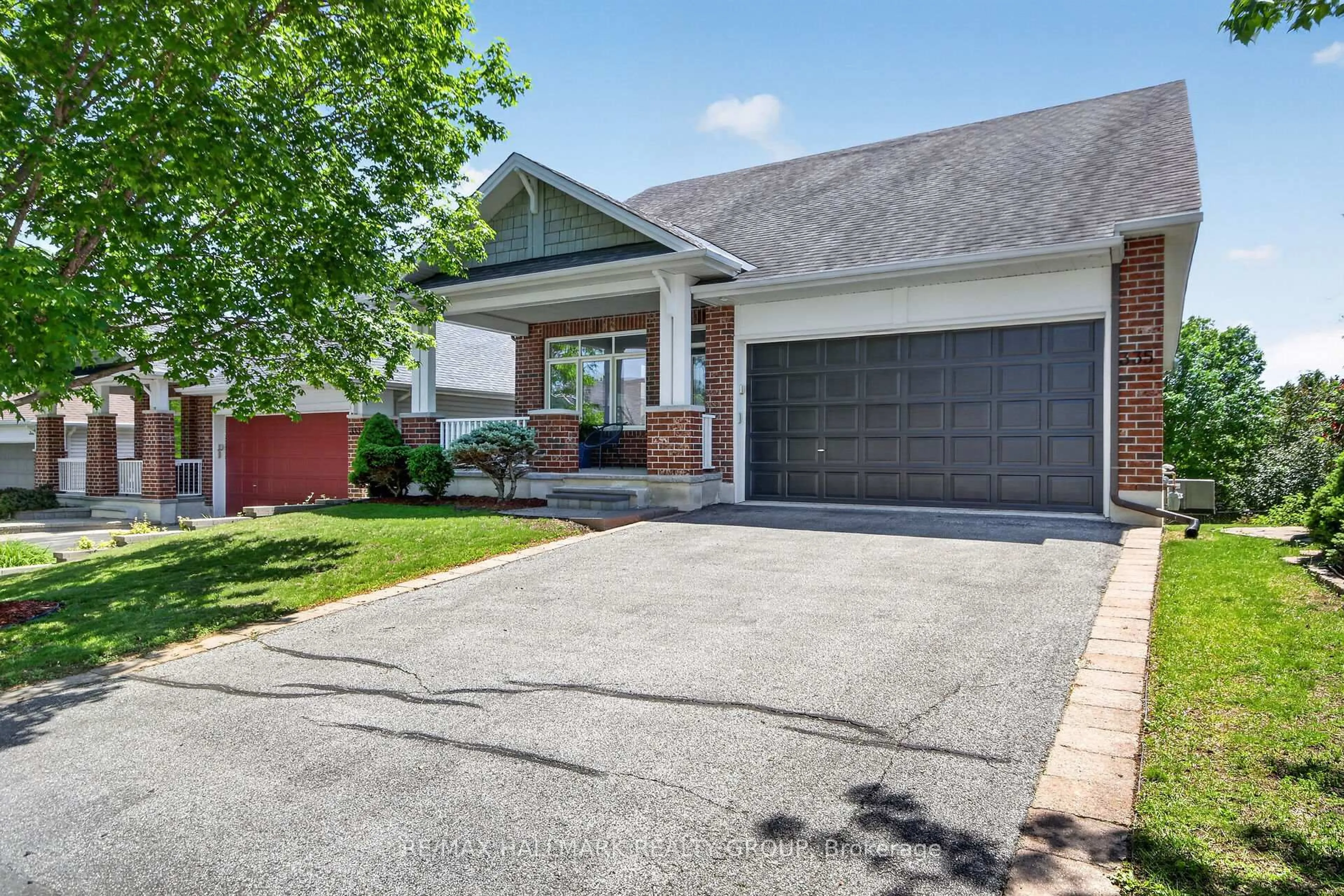 Home with brick exterior material, street for 335 Jackson Stitt Circ, Ottawa Ontario K2S 0C4