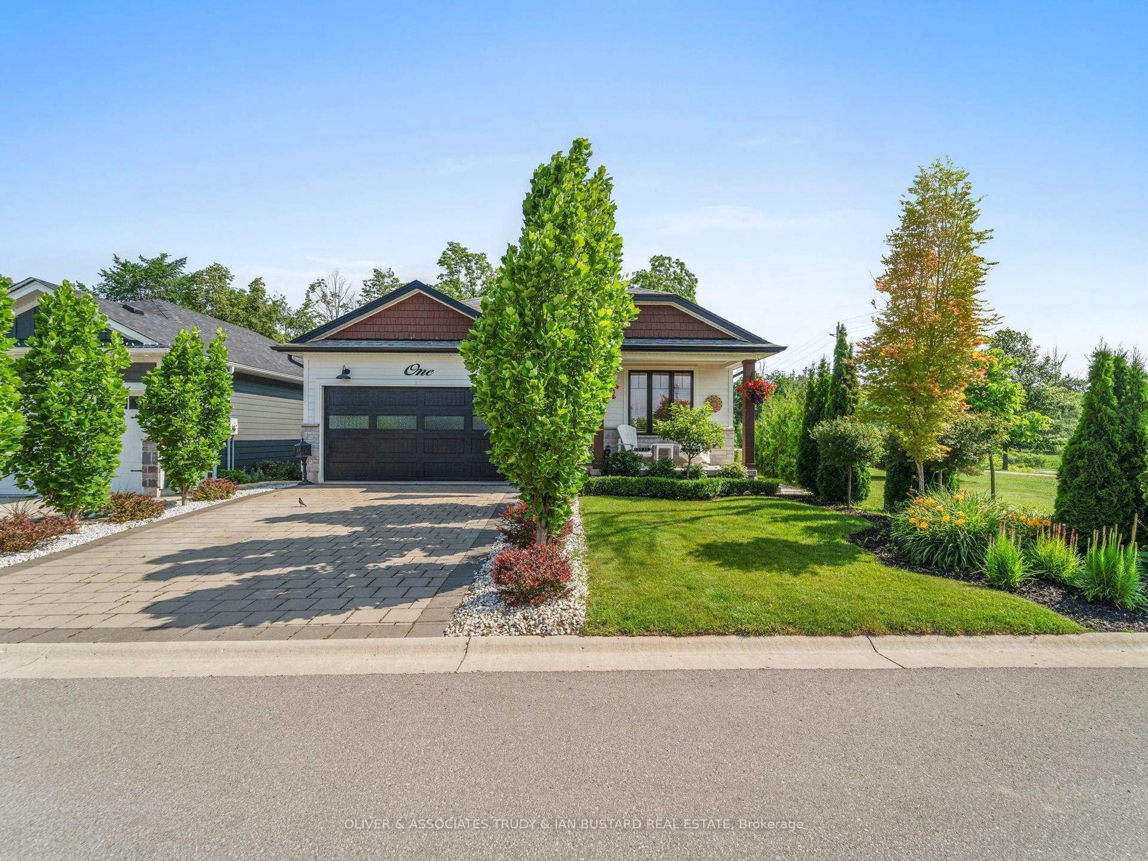 Home with brick exterior material, street for 1 Creek Side Pl, Lambton Shores Ontario N0M 1T0