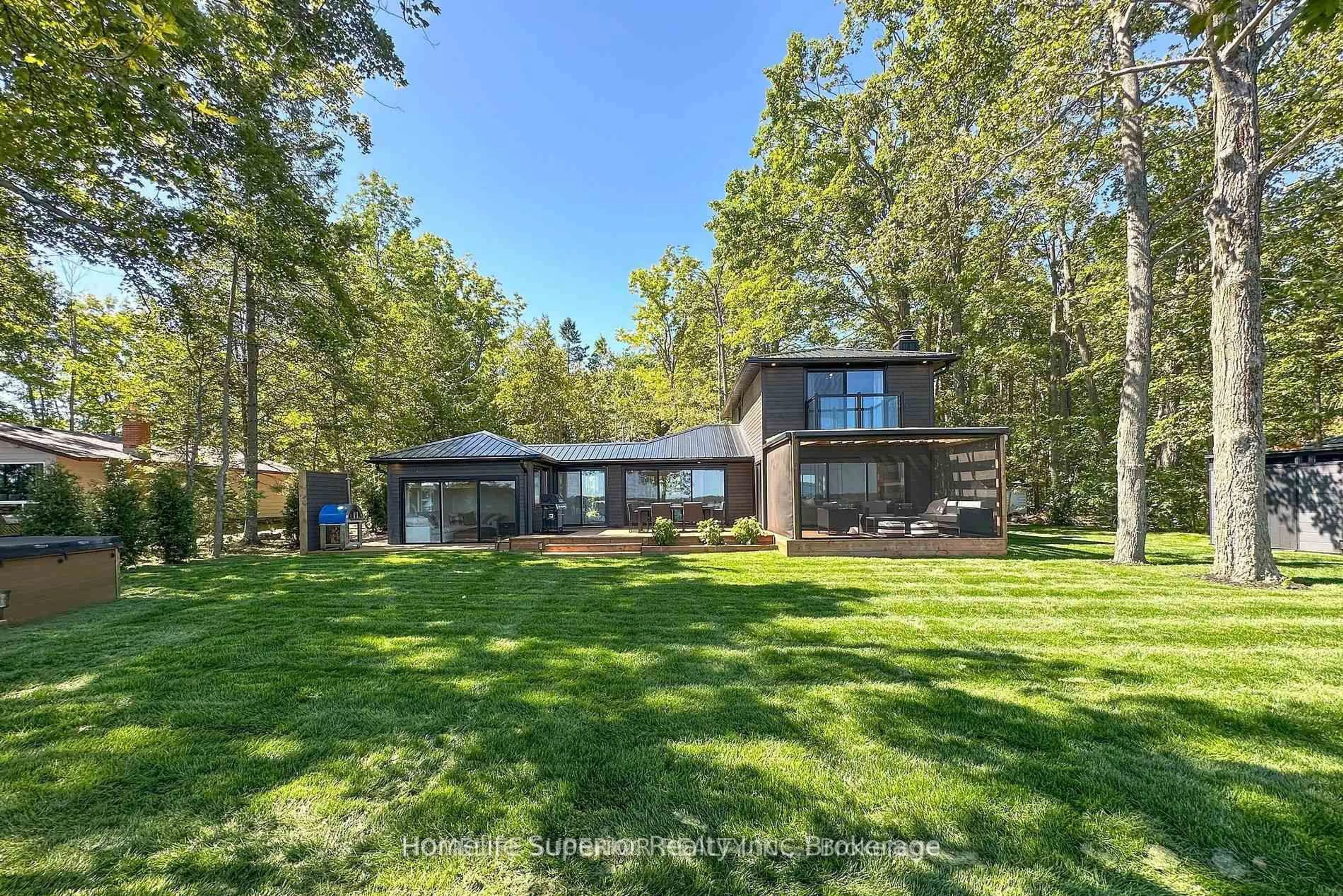 A pic from outside/outdoor area/front of a property/back of a property/a pic from drone, unknown for 110 West Bay Blvd, Kawartha Lakes Ontario K0M 2B0
